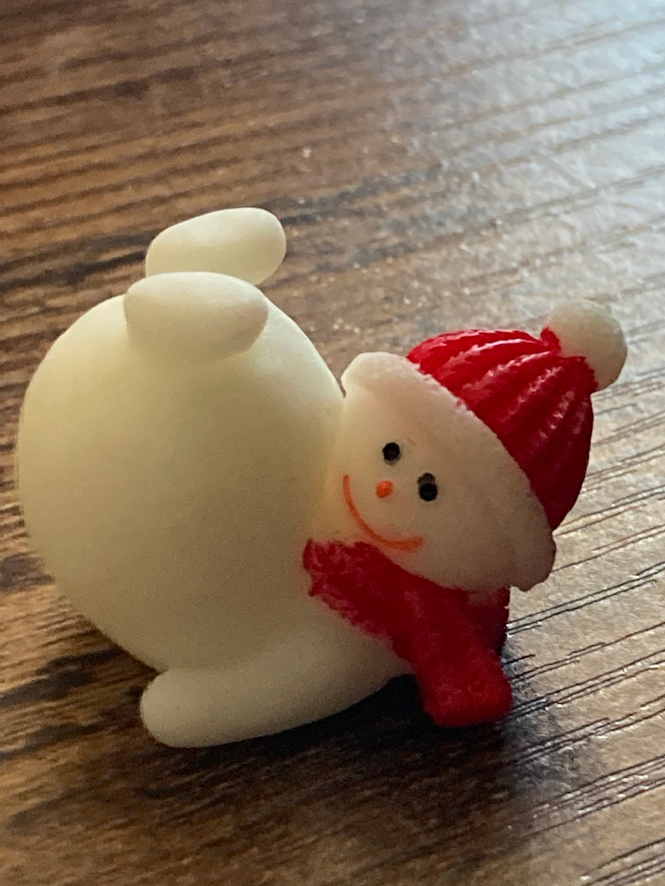 Cute tumbling snowman cake topper in plastic Christmas