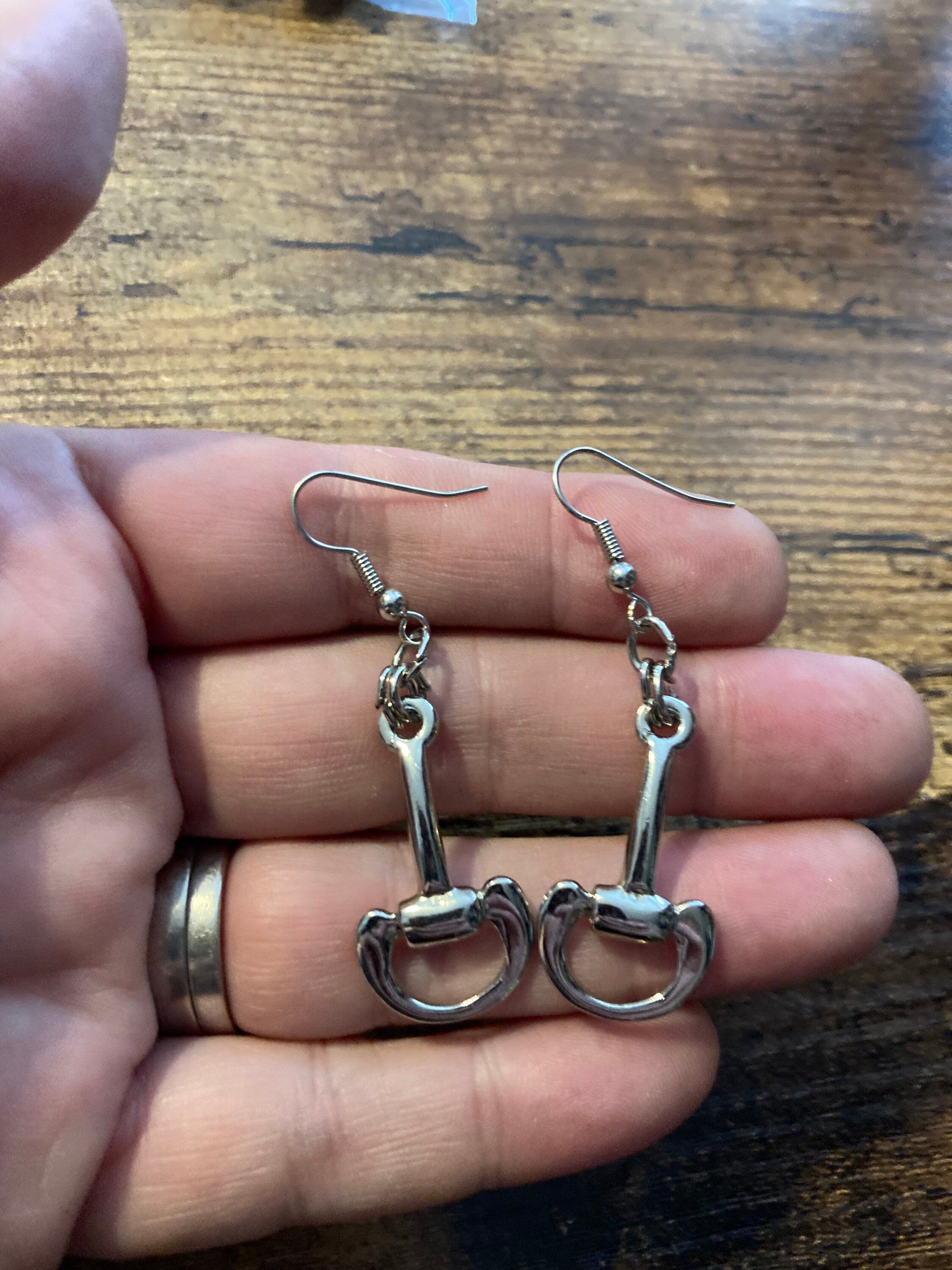 Pair of Retro silver tone equestrian snaffle bit link designer dangly stirrup earrings frank usher