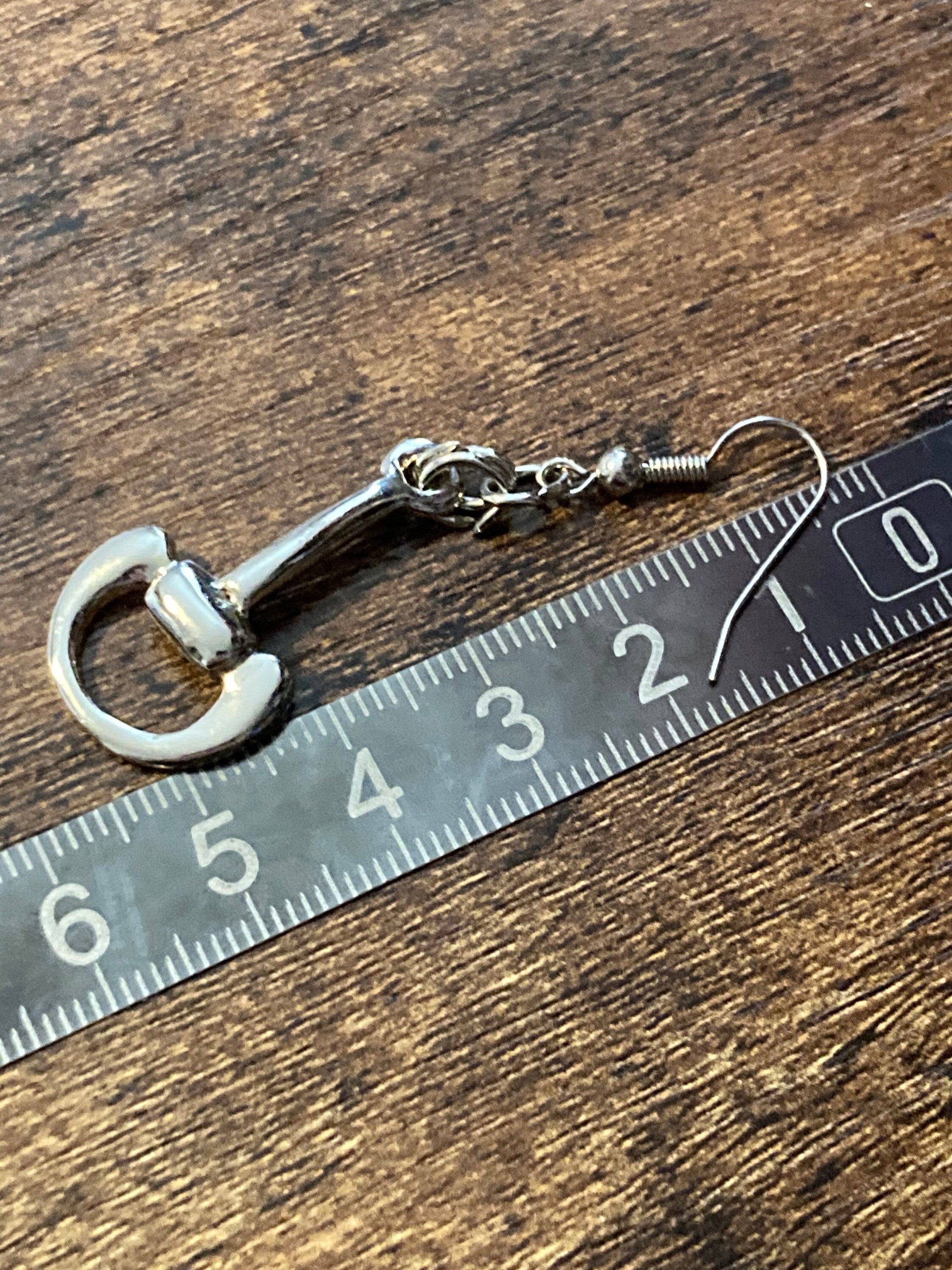 Pair of Retro silver tone equestrian snaffle bit link designer dangly stirrup earrings frank usher