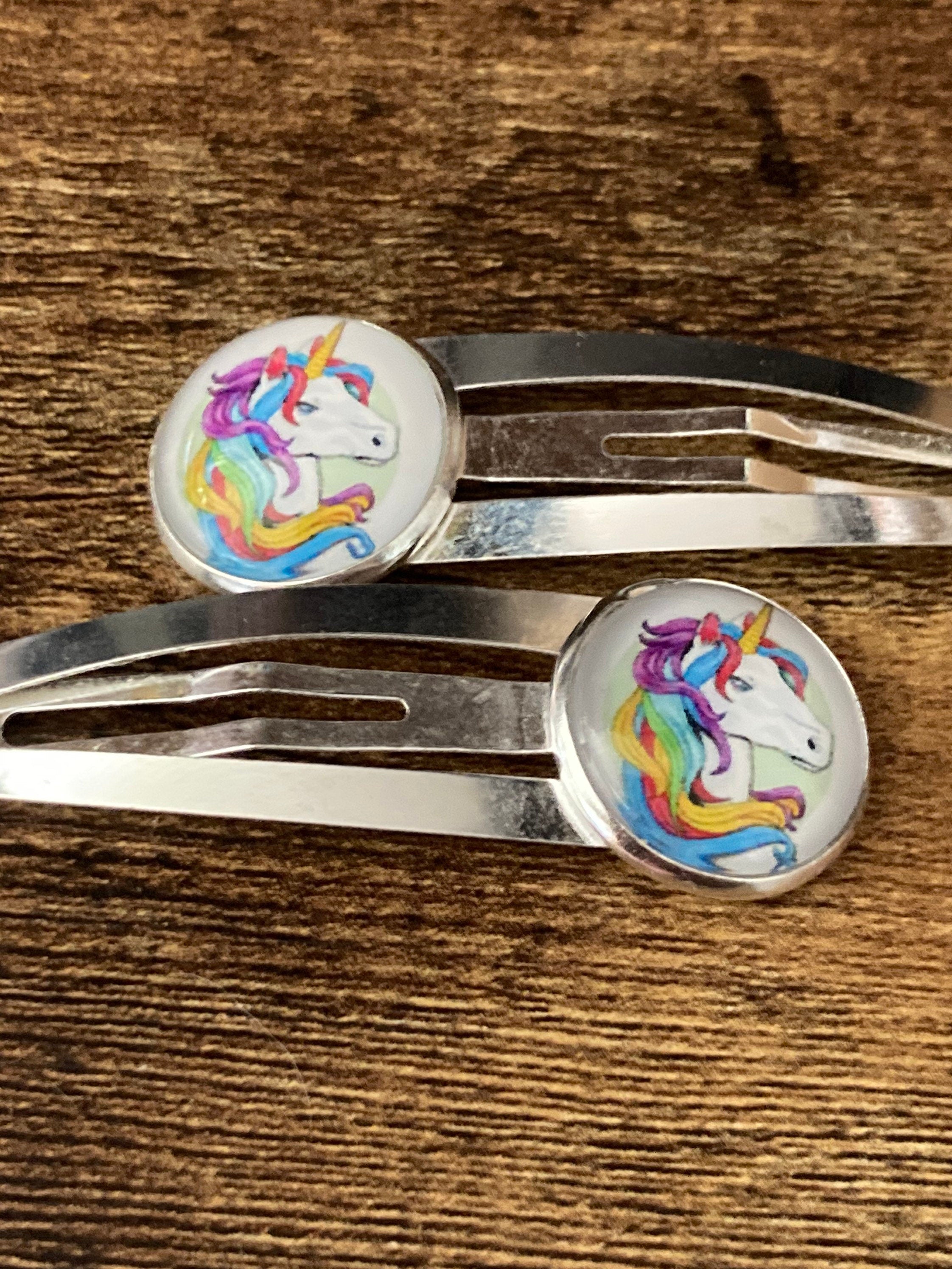 pair of Unicorn hair clips silver tone snap lock closure