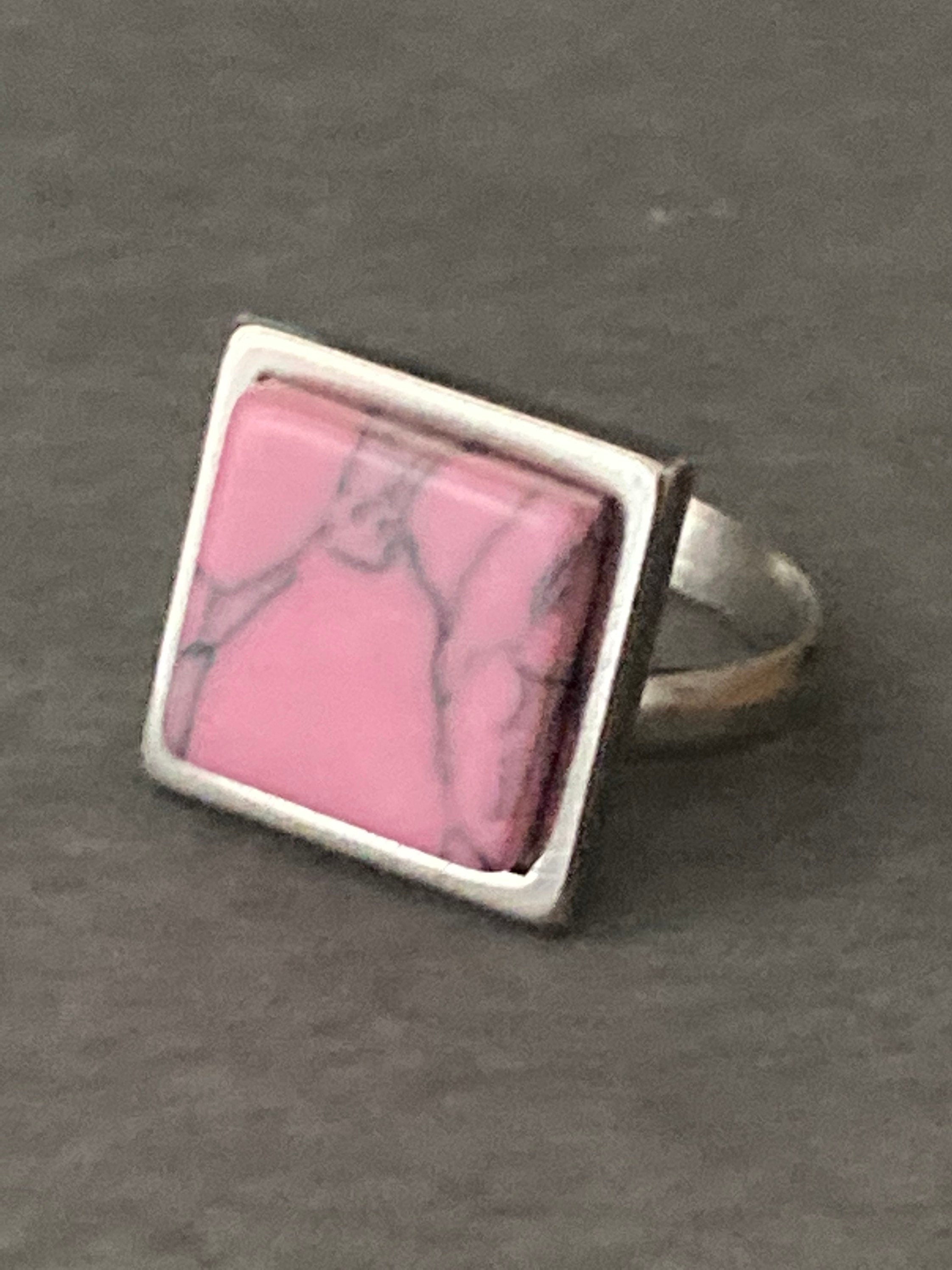 Pink marbled gemstone stud earrings in stainless steel