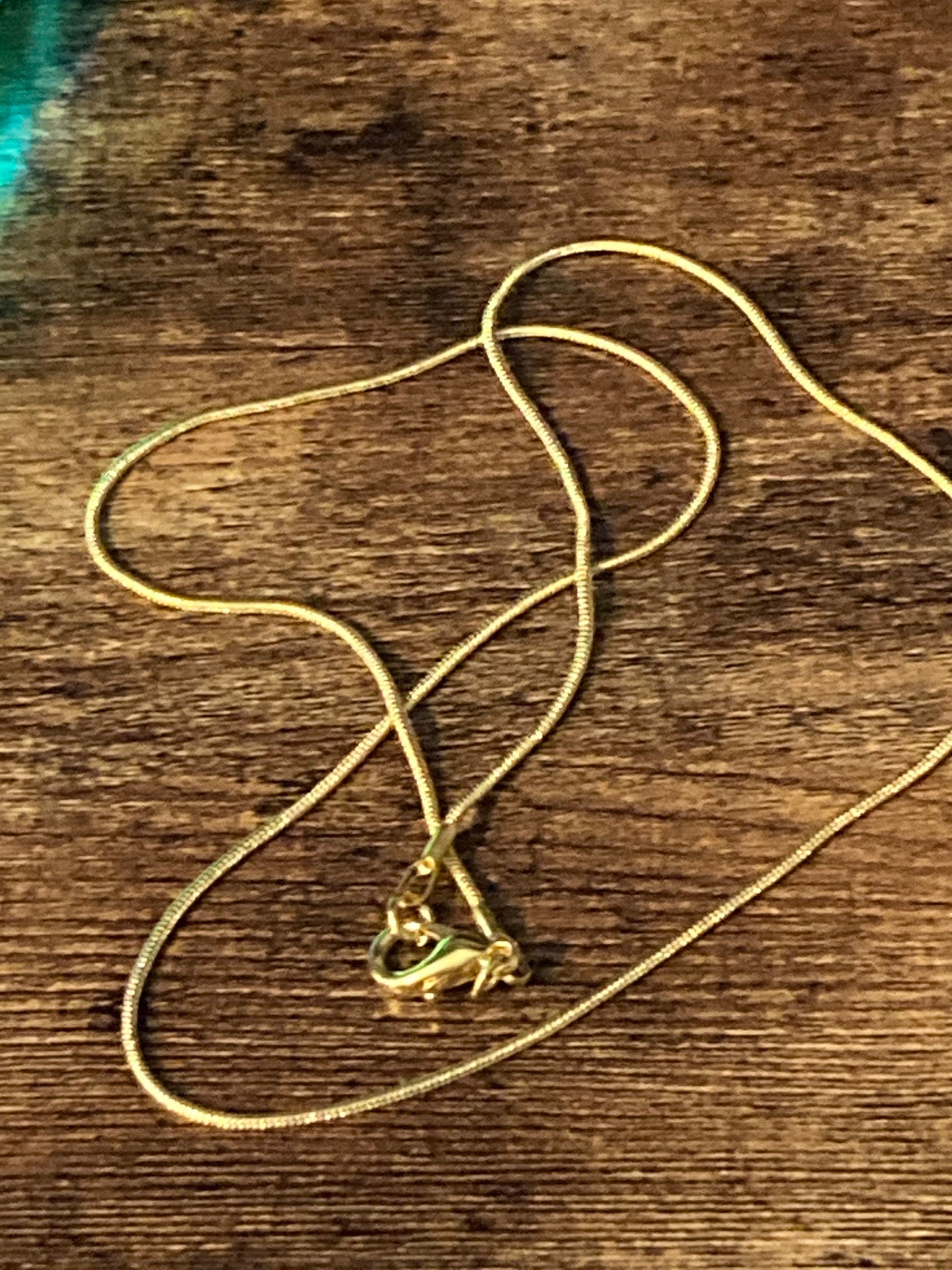 Gold Tone Snake Chain Necklace: 1.2mm, 18 inch