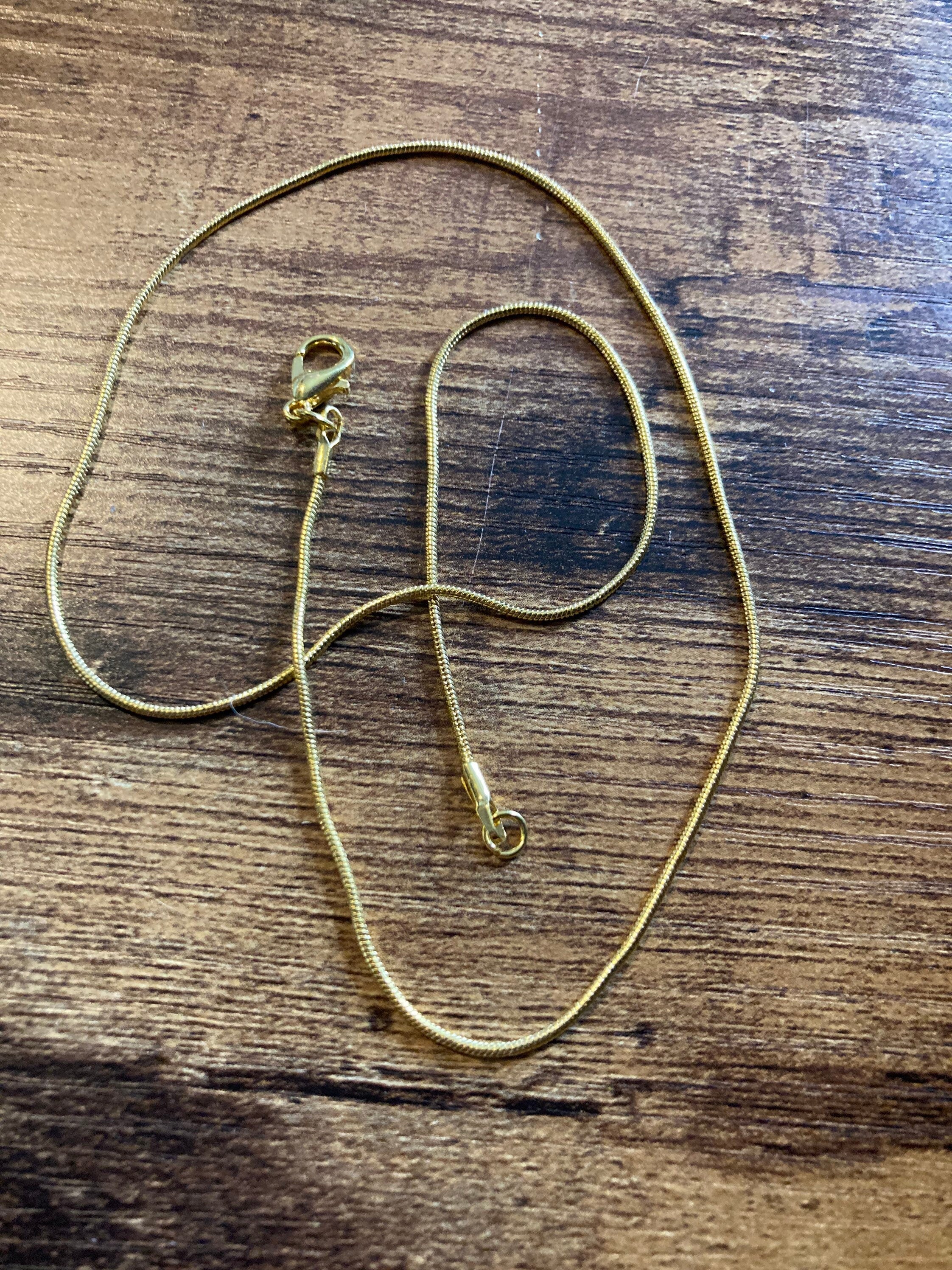 Gold Tone Snake Chain Necklace: 1.2mm, 18 inch