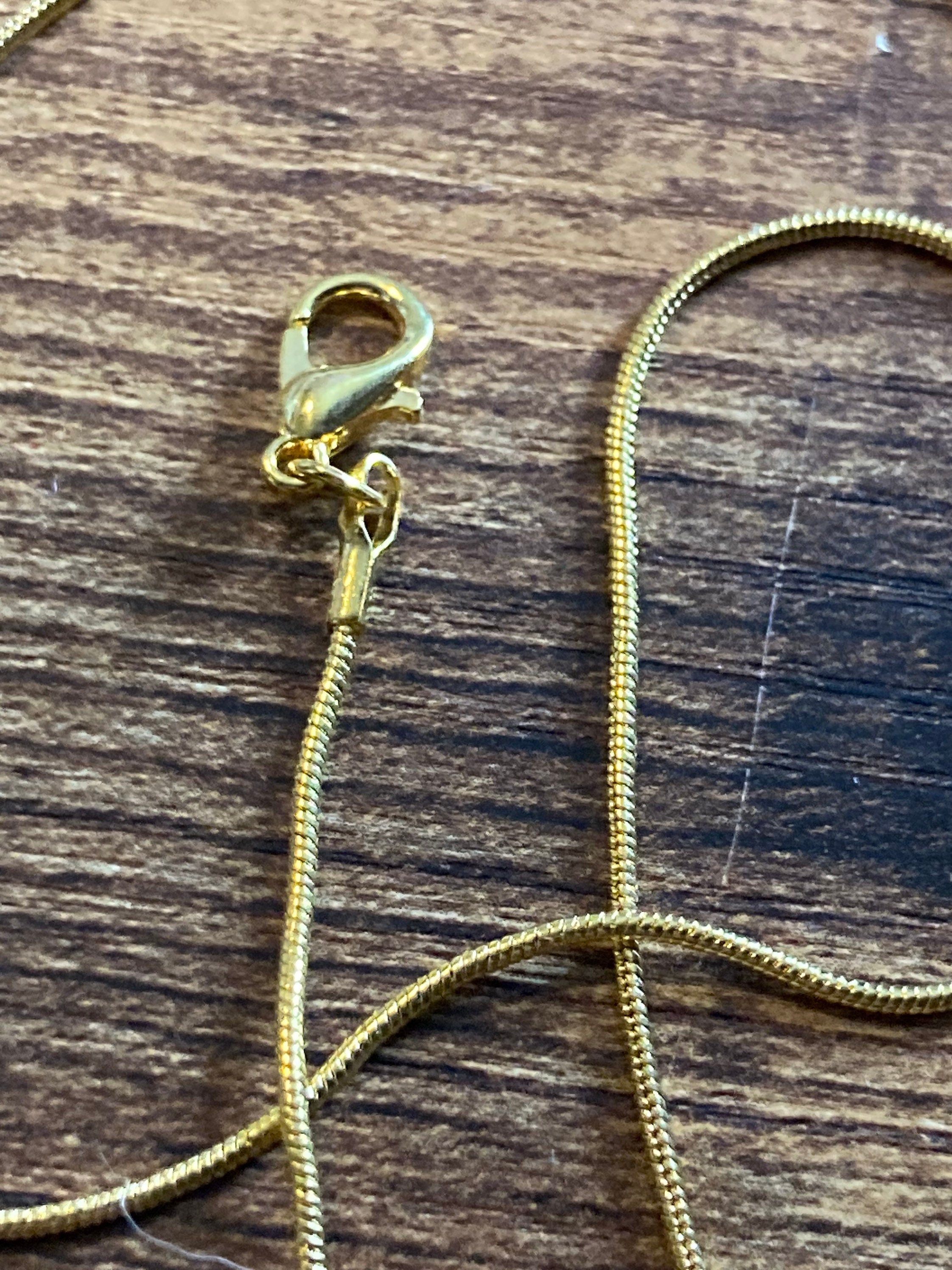 Gold Tone Snake Chain Necklace: 1.2mm, 18 inch