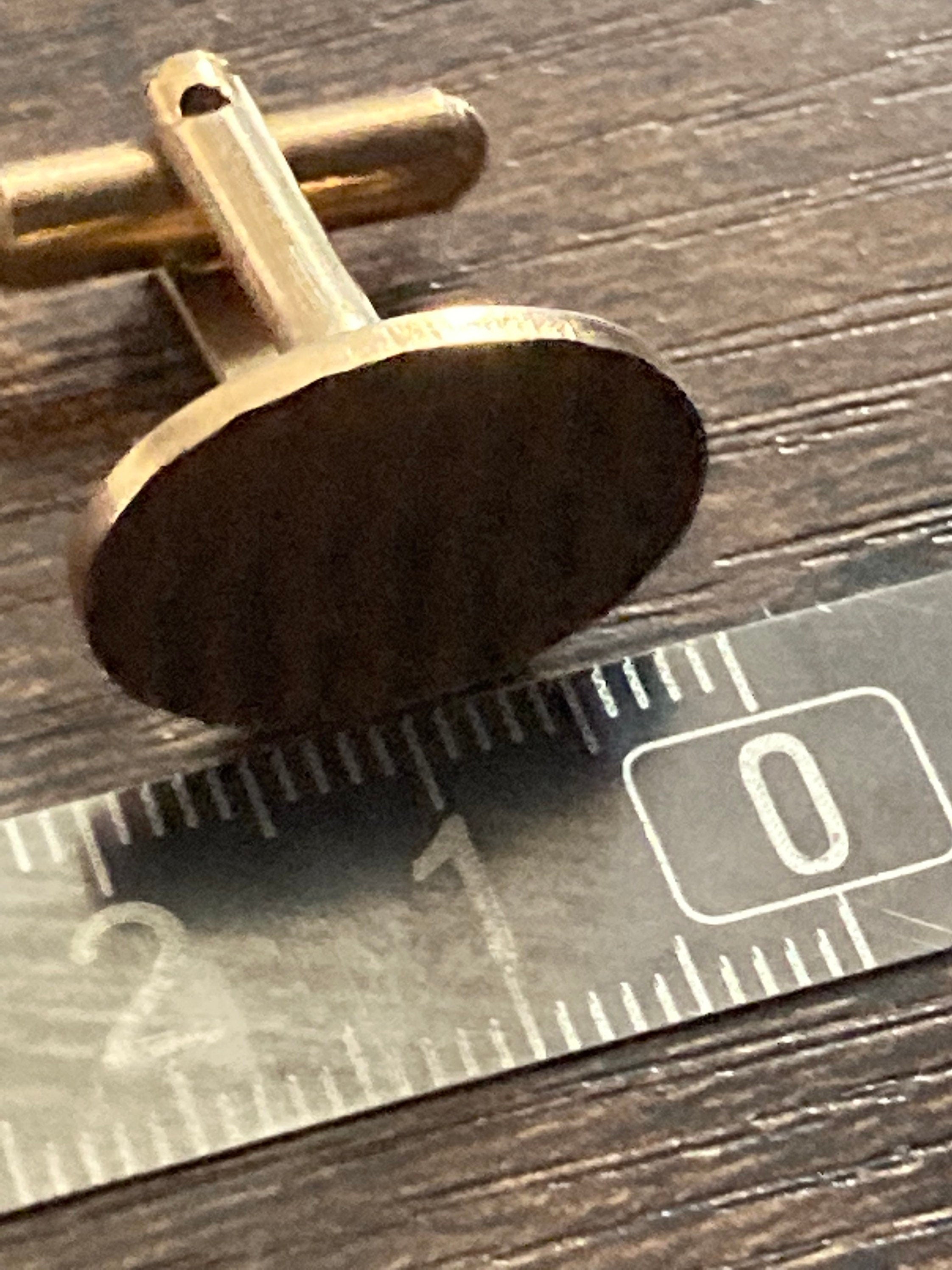 modernist men’s gold tone oval textured plain cufflinks