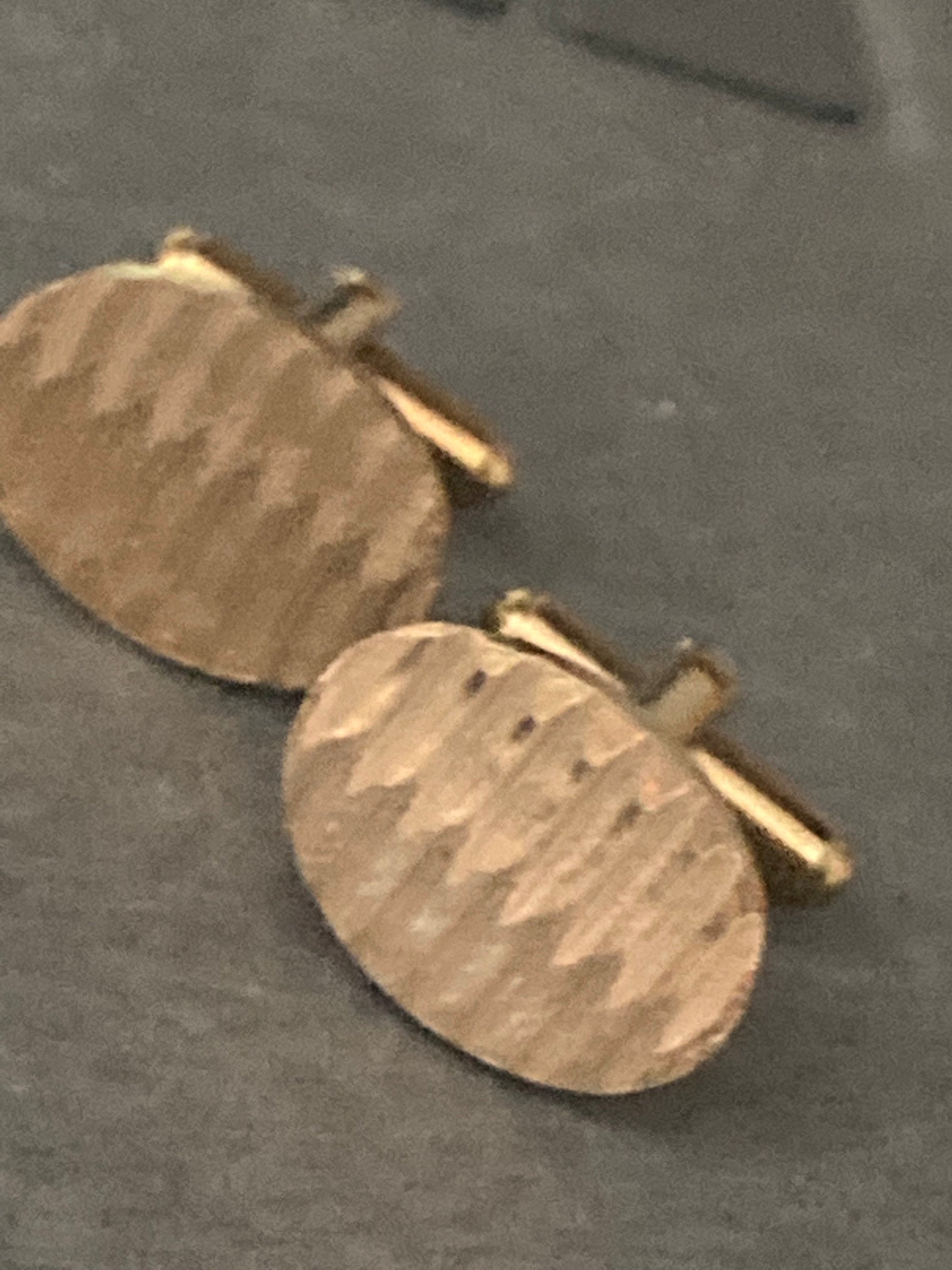 modernist men’s gold tone oval textured plain cufflinks