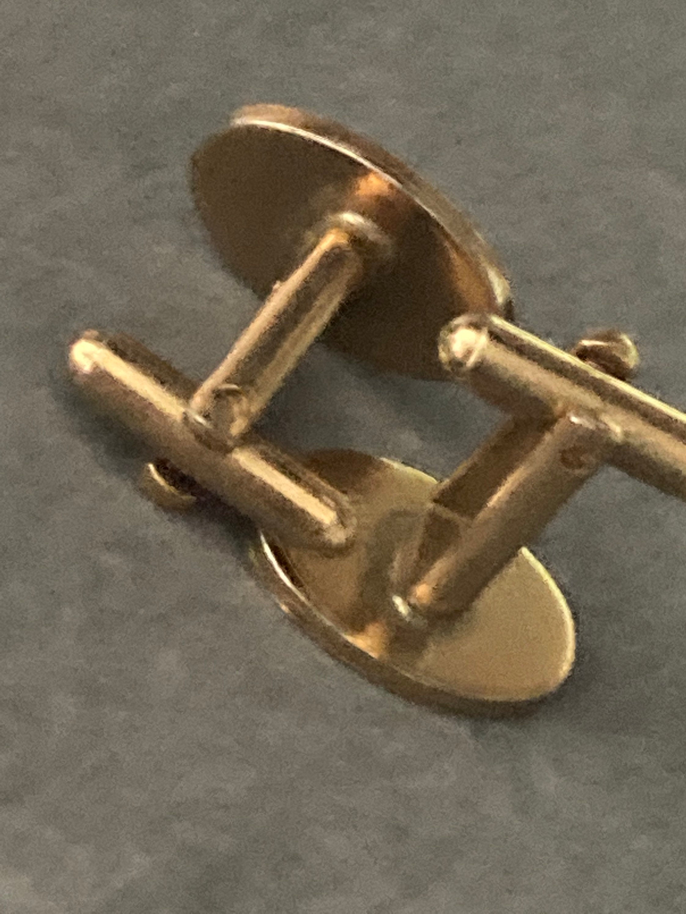 modernist men’s gold tone oval textured plain cufflinks