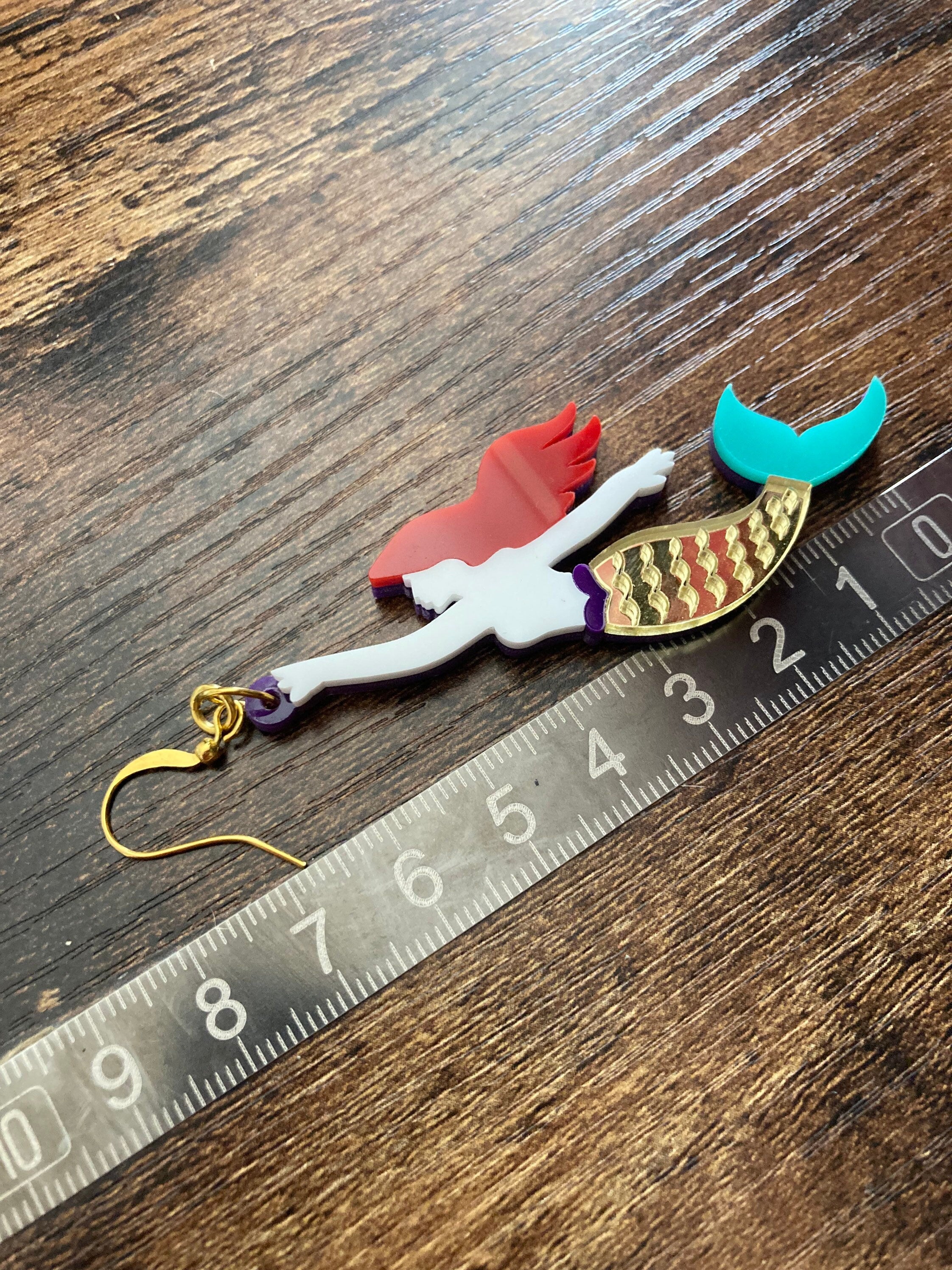 Novelty gold metallic Little mermaid long drop Earrings Perspex