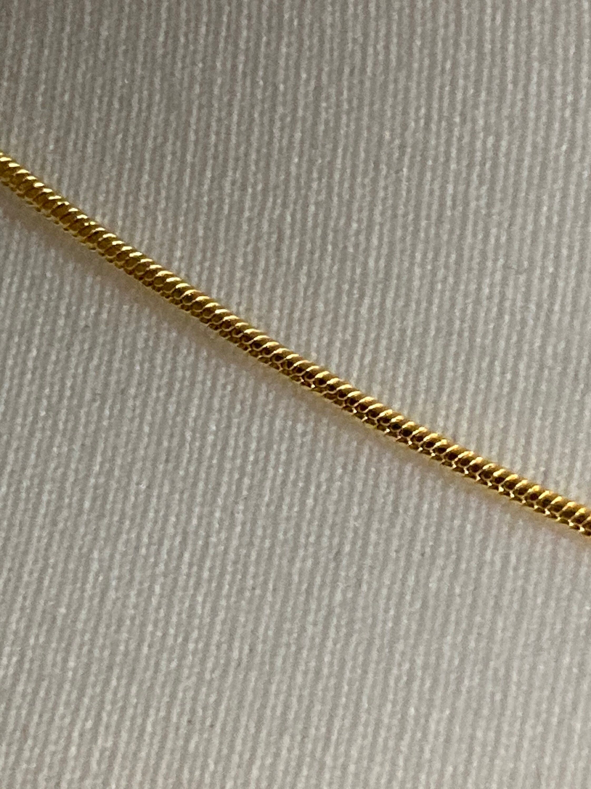 Gold Tone Snake Chain Necklace: 1.2mm, 18 inch