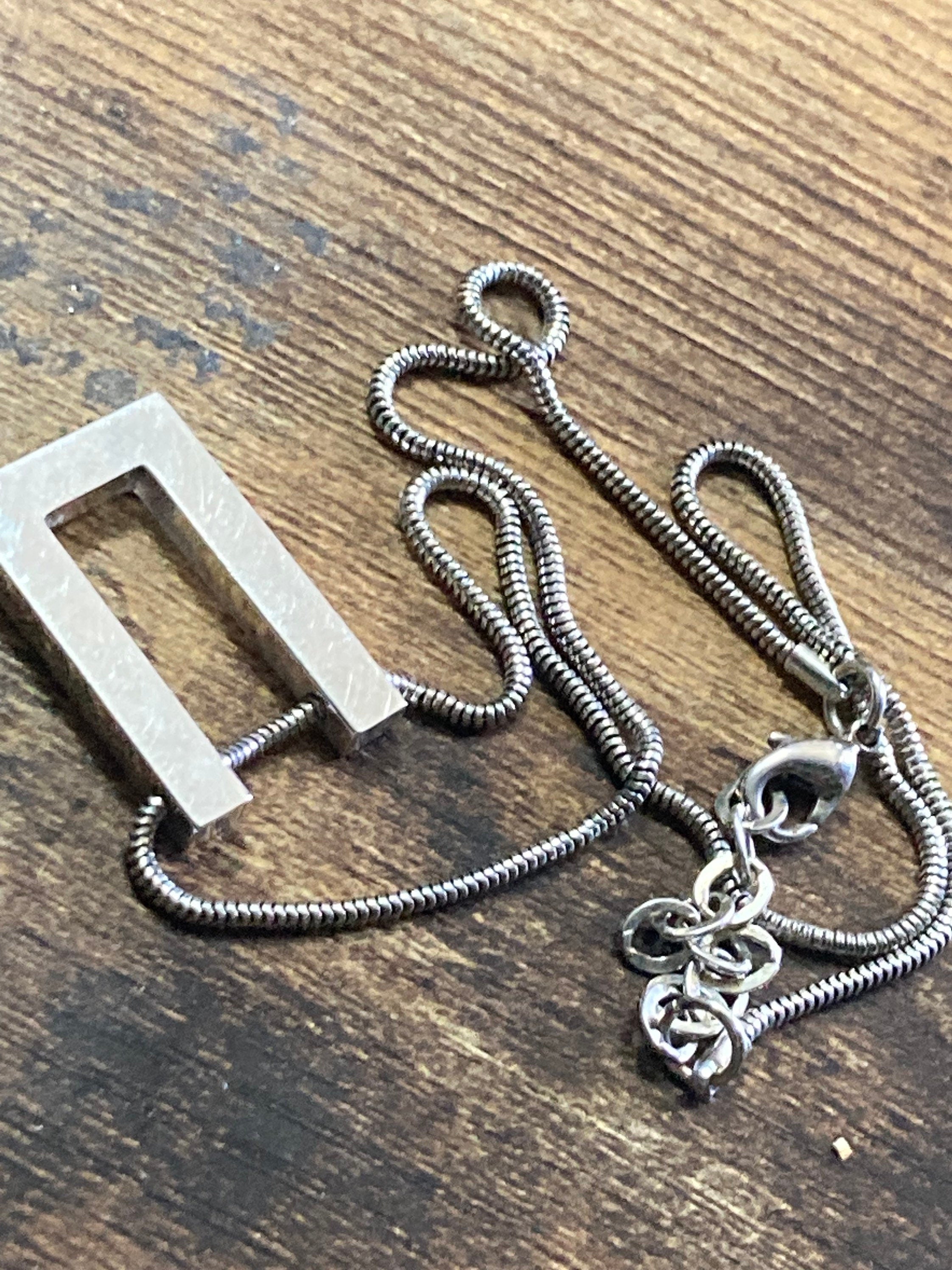 Signed SIDNEY CARRON Paris silver tone pendant and chain French designer minimalist