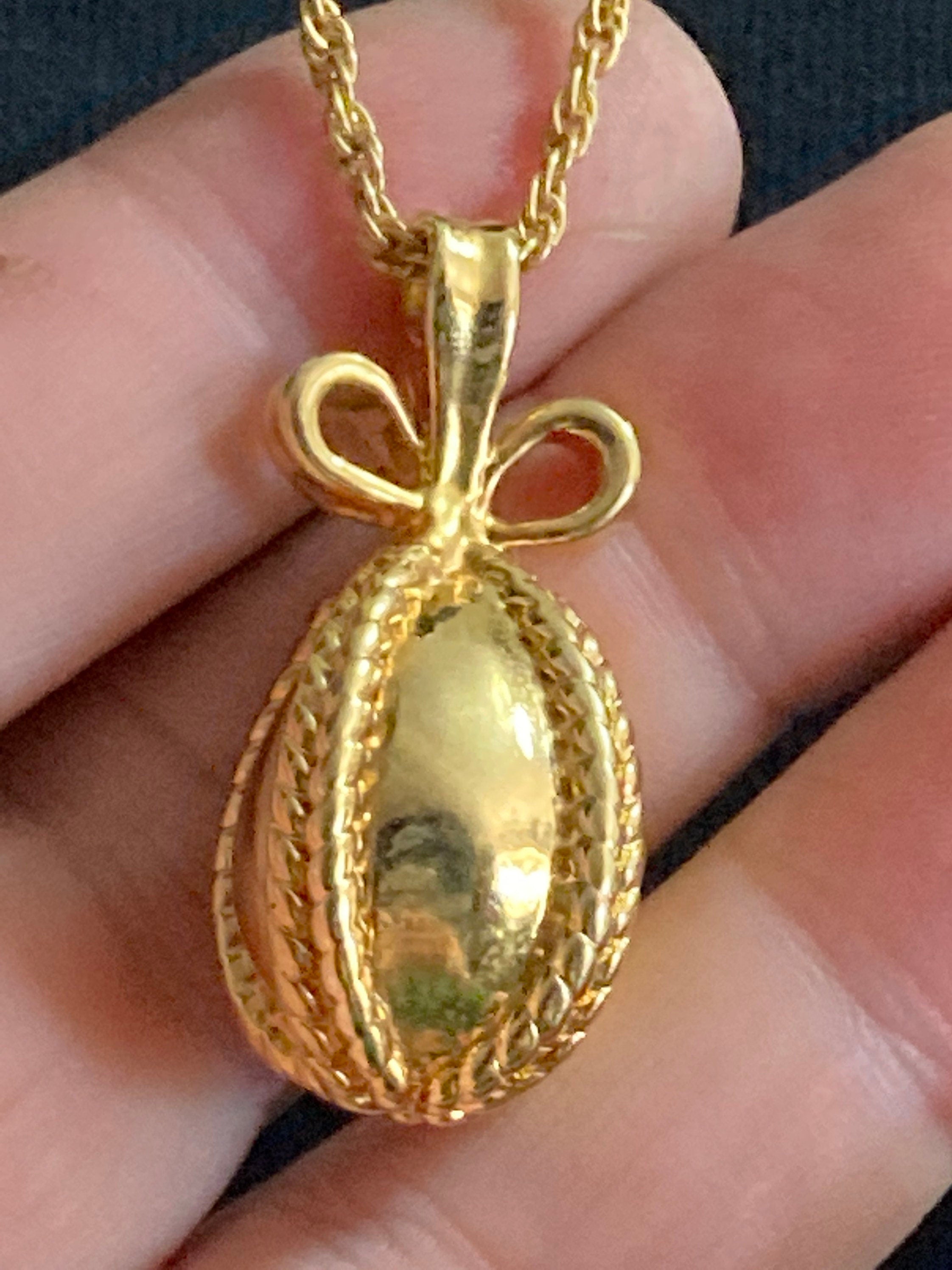 Joan Rivers Gold Faberge inspired bow egg pendant necklace on 75cm rope chain