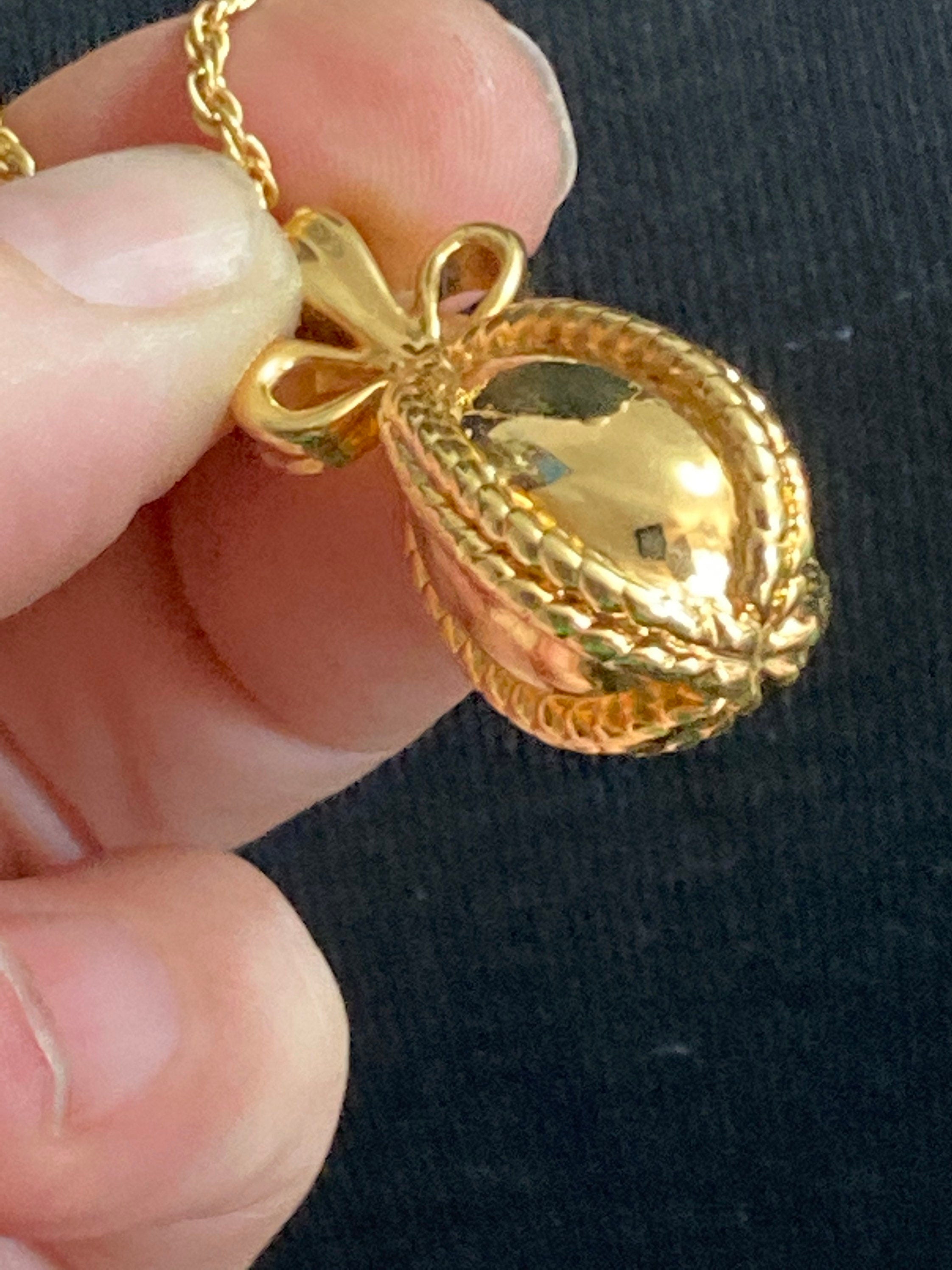 Joan Rivers Gold Faberge inspired bow egg pendant necklace on 75cm rope chain