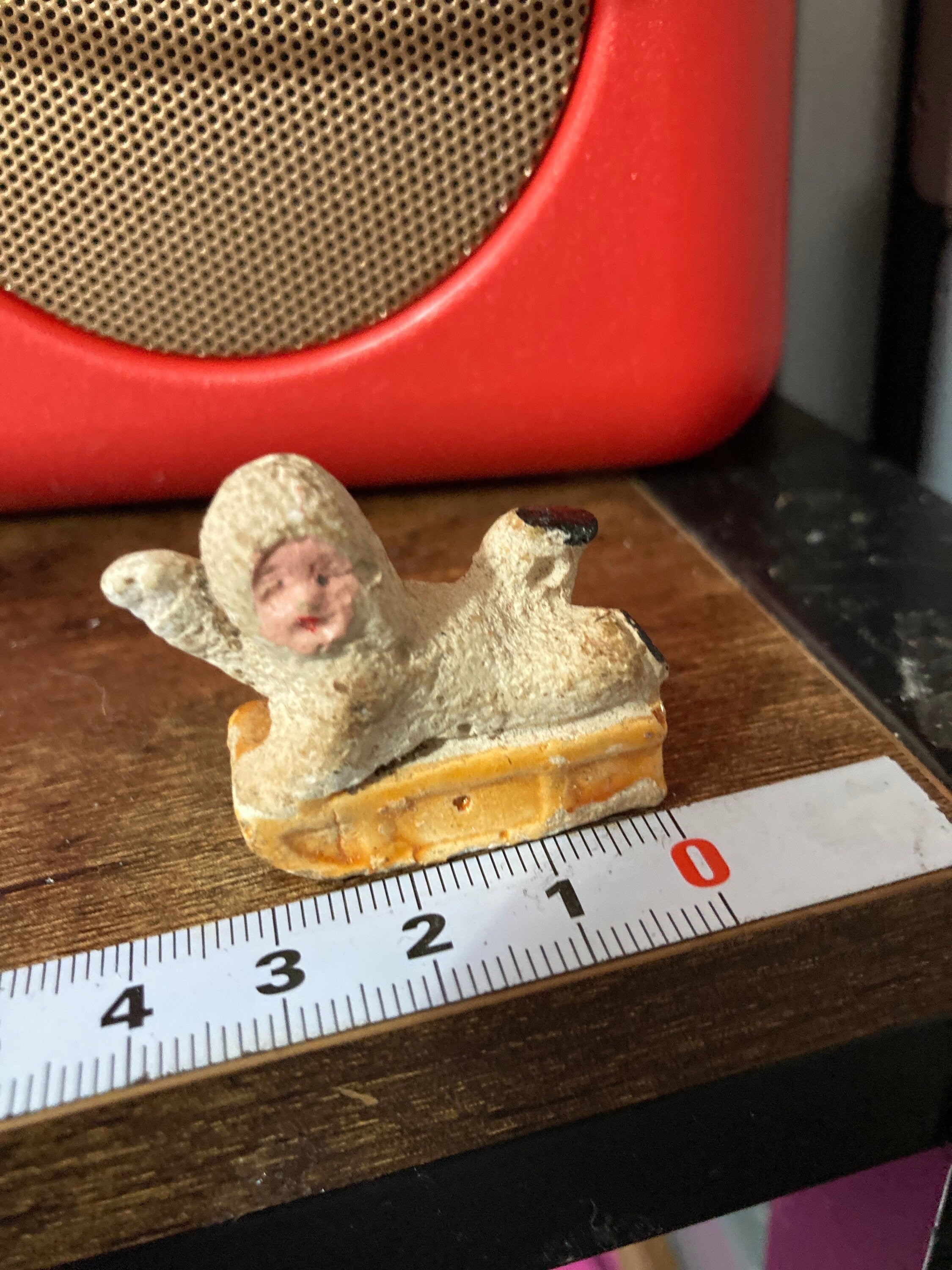 Antique Vintage PLASTER or bisque Snow Baby on sledge Christmas Xmas Cake topper