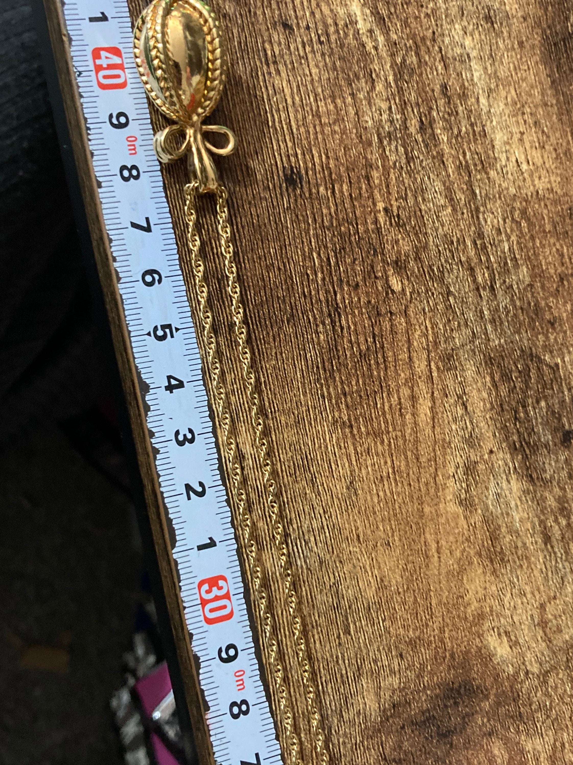 Joan Rivers Gold Faberge inspired bow egg pendant necklace on 75cm rope chain