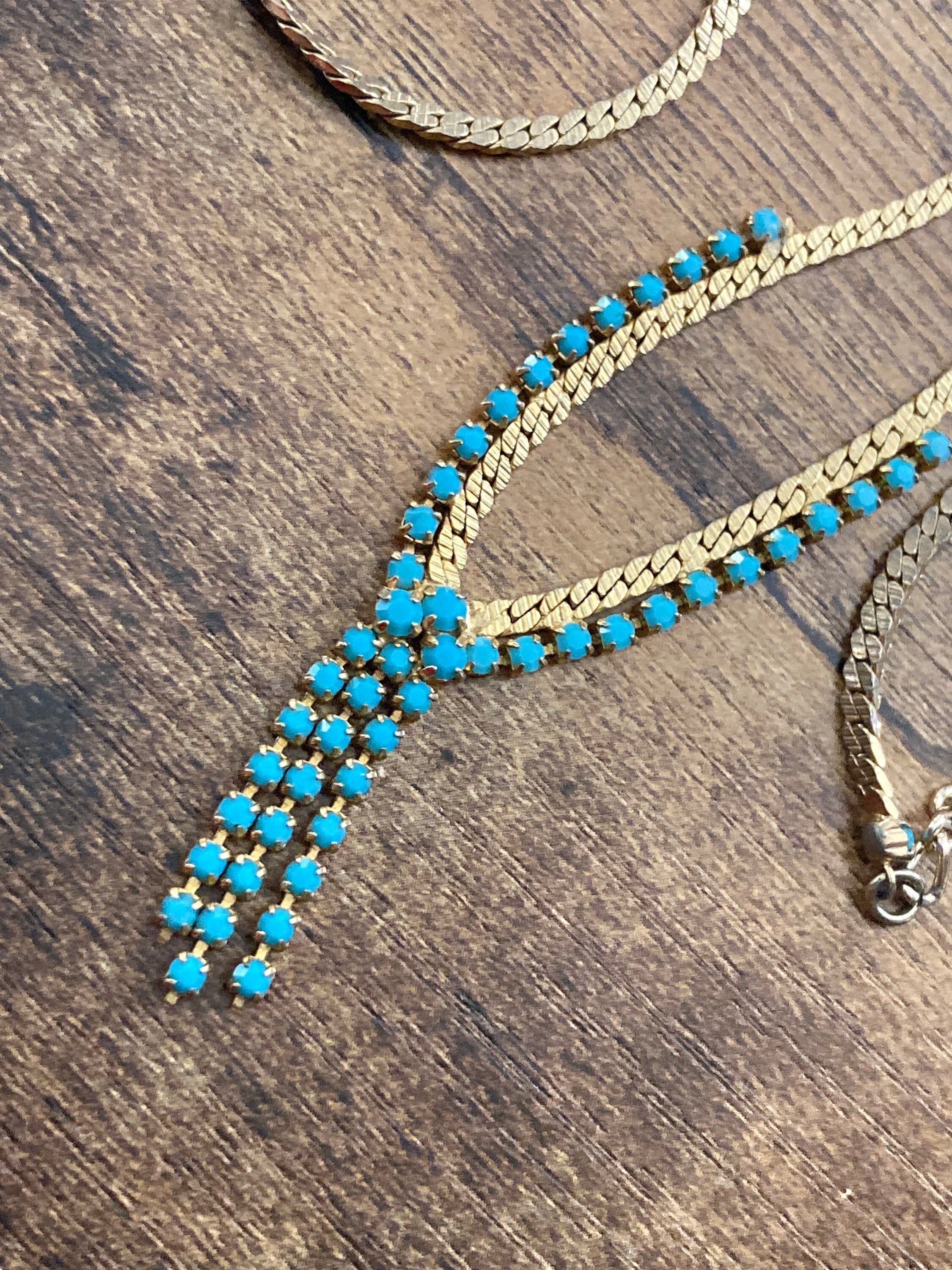 1970s gold tone mesh lariat drop necklace with turquoise glass paste