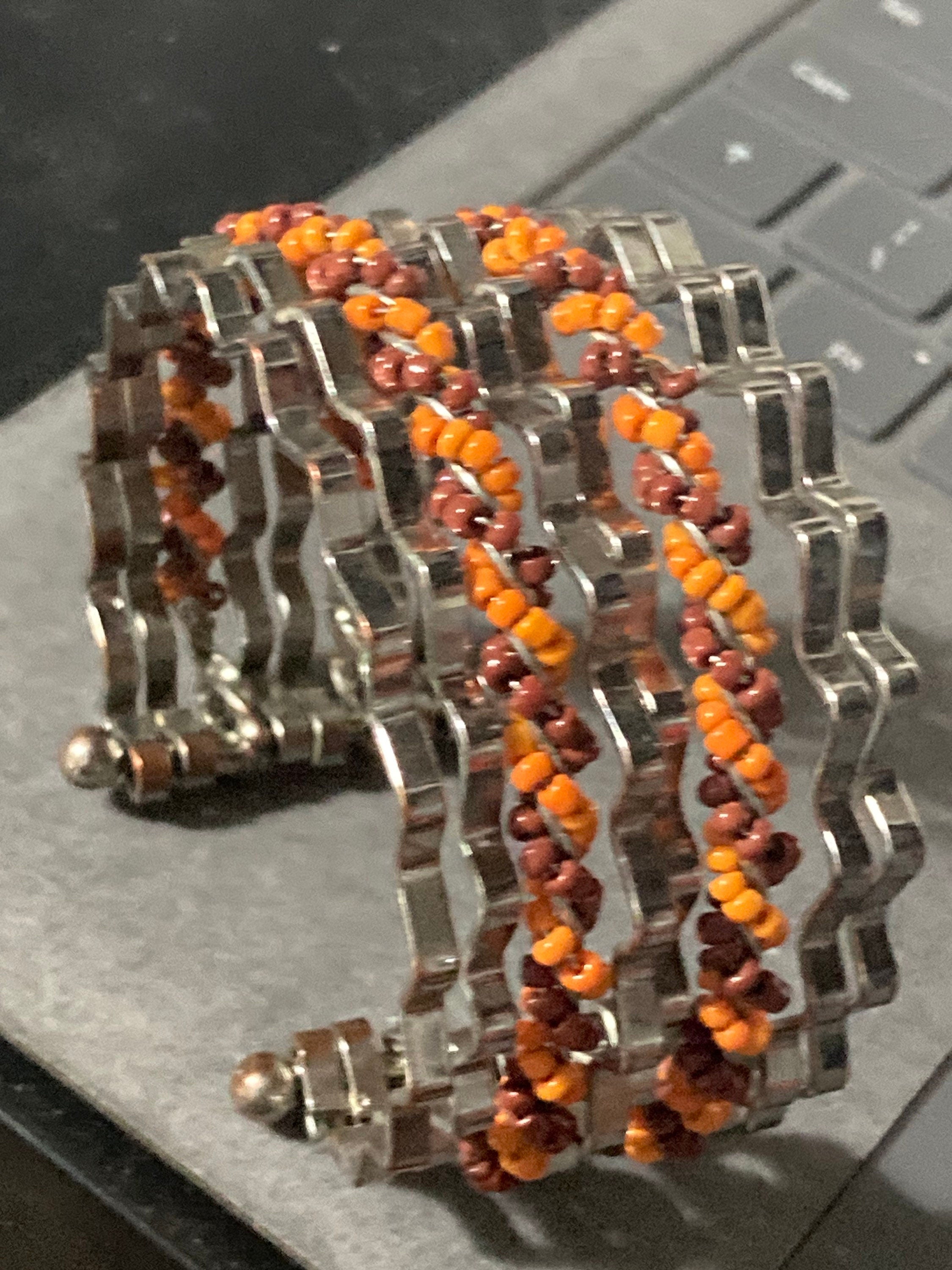 Retro modernist silver tone coral beaded wide cuff bangle