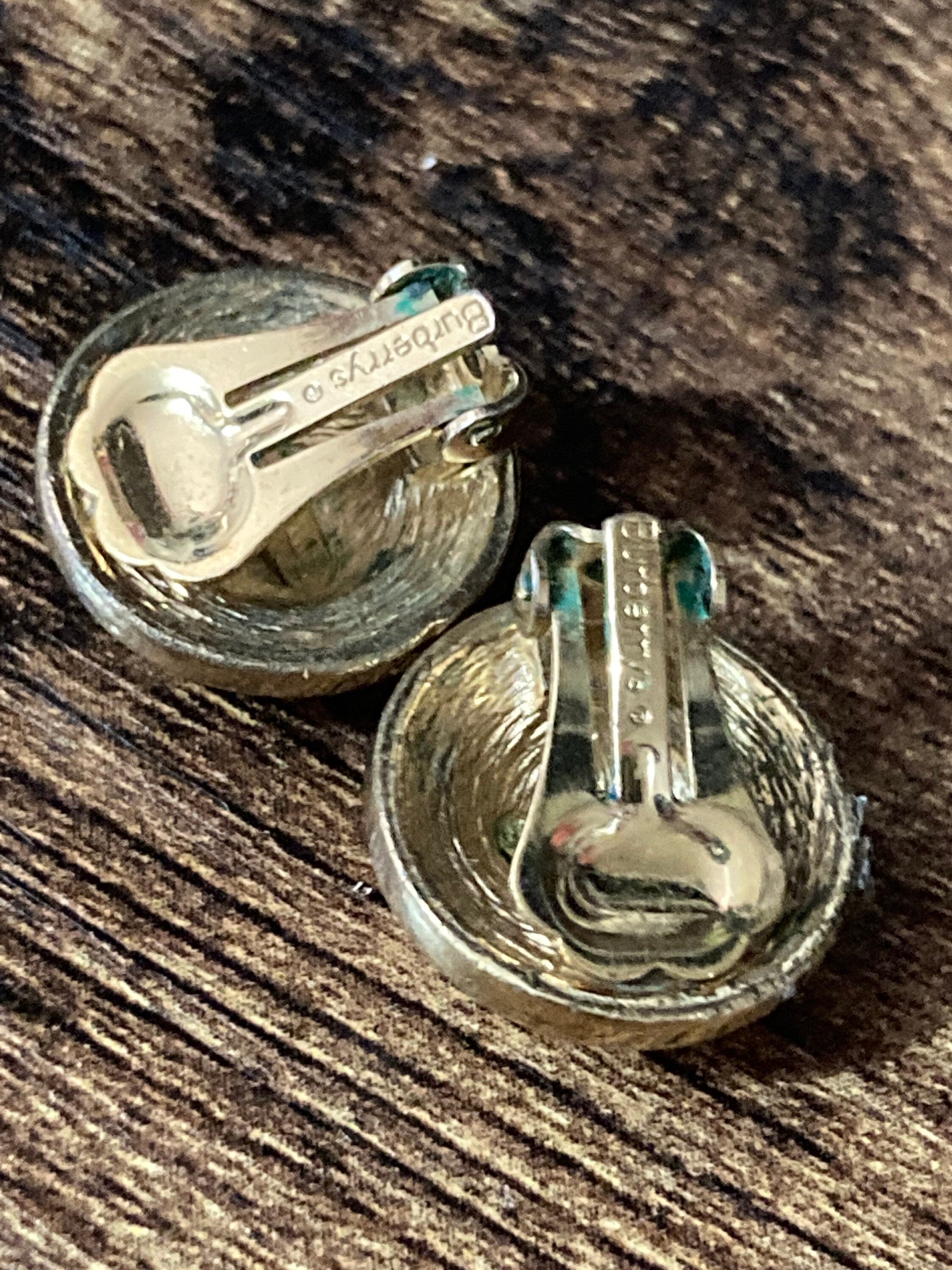 Signed BURBERRY diamanté gold and silver tone clip on stud earrings