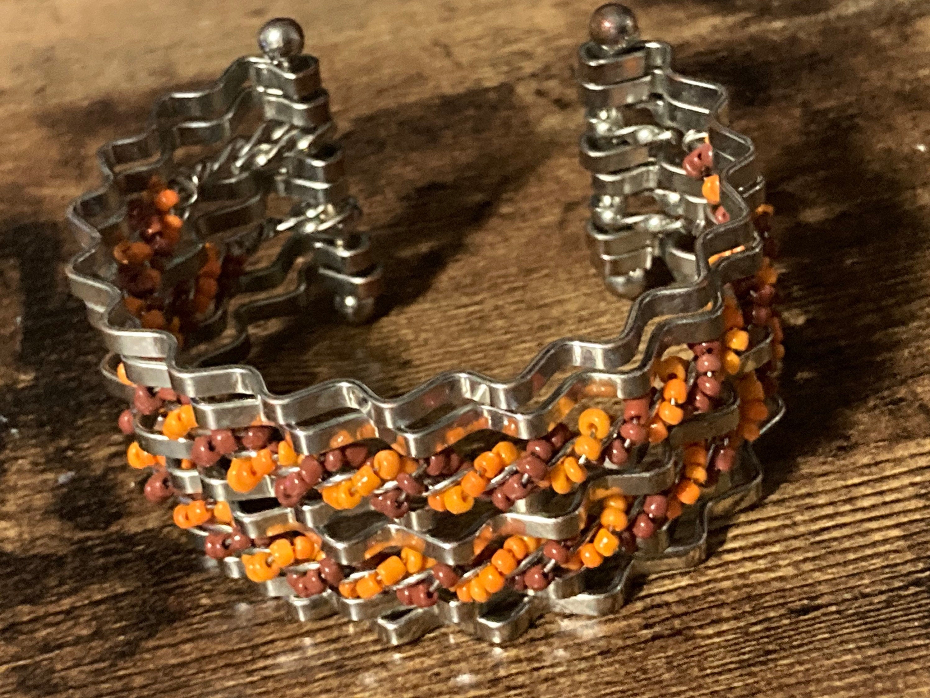 Retro modernist silver tone coral beaded wide cuff bangle