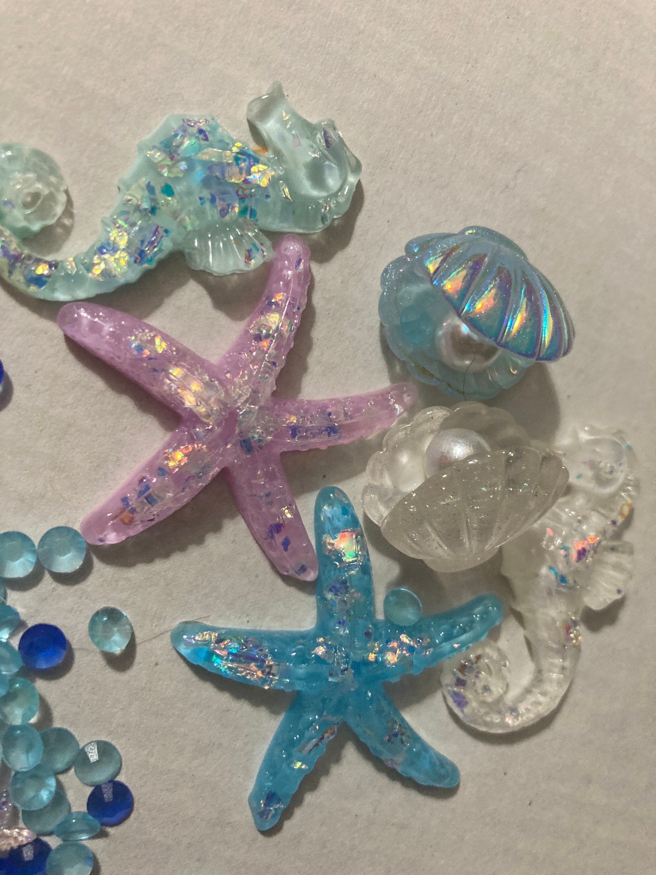Mixed bag of sealife nautical fish, shells and starfish miniature plastic cabochons for craft