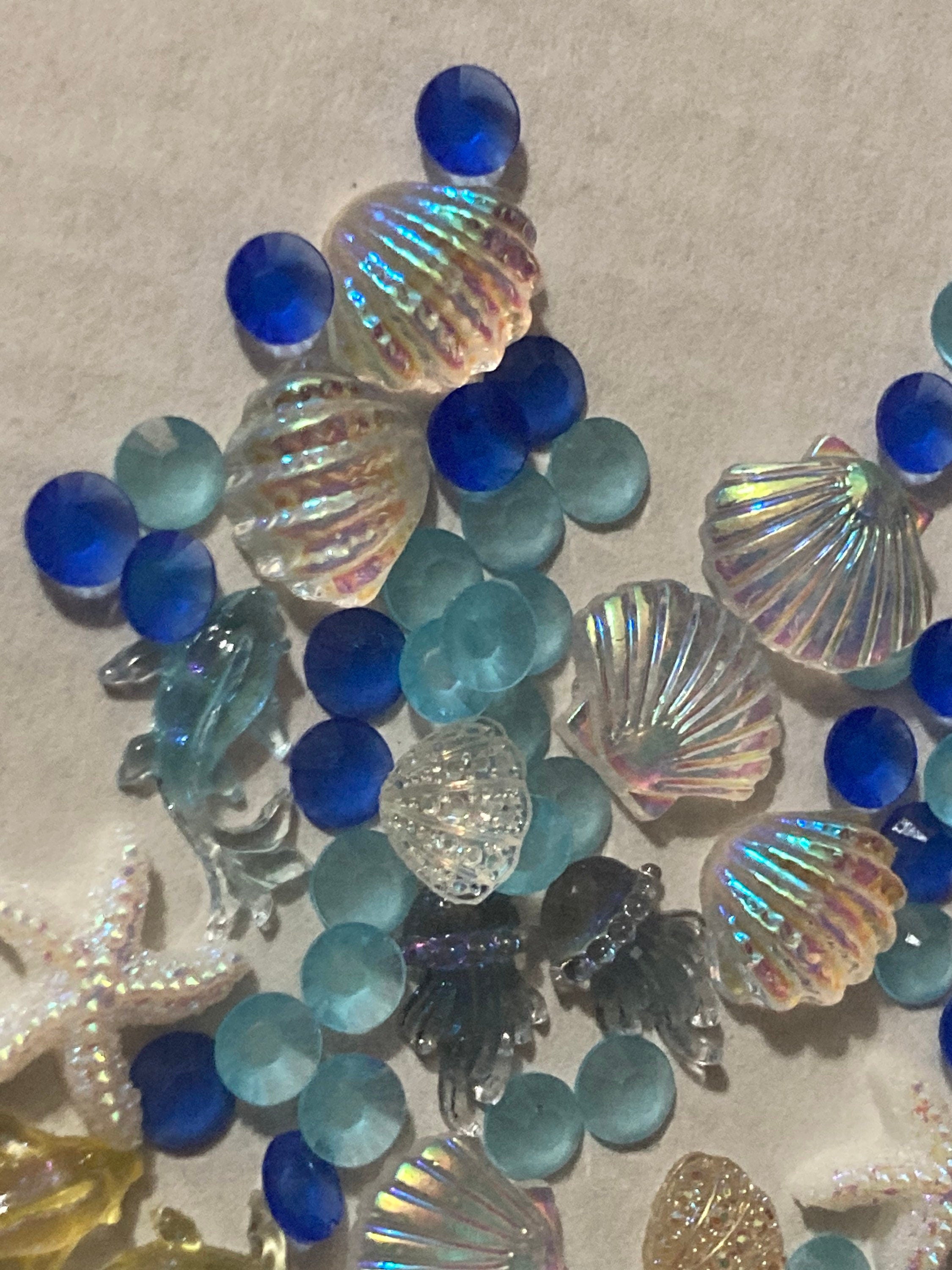 Mixed bag of sealife nautical fish, shells and starfish miniature plastic cabochons for craft