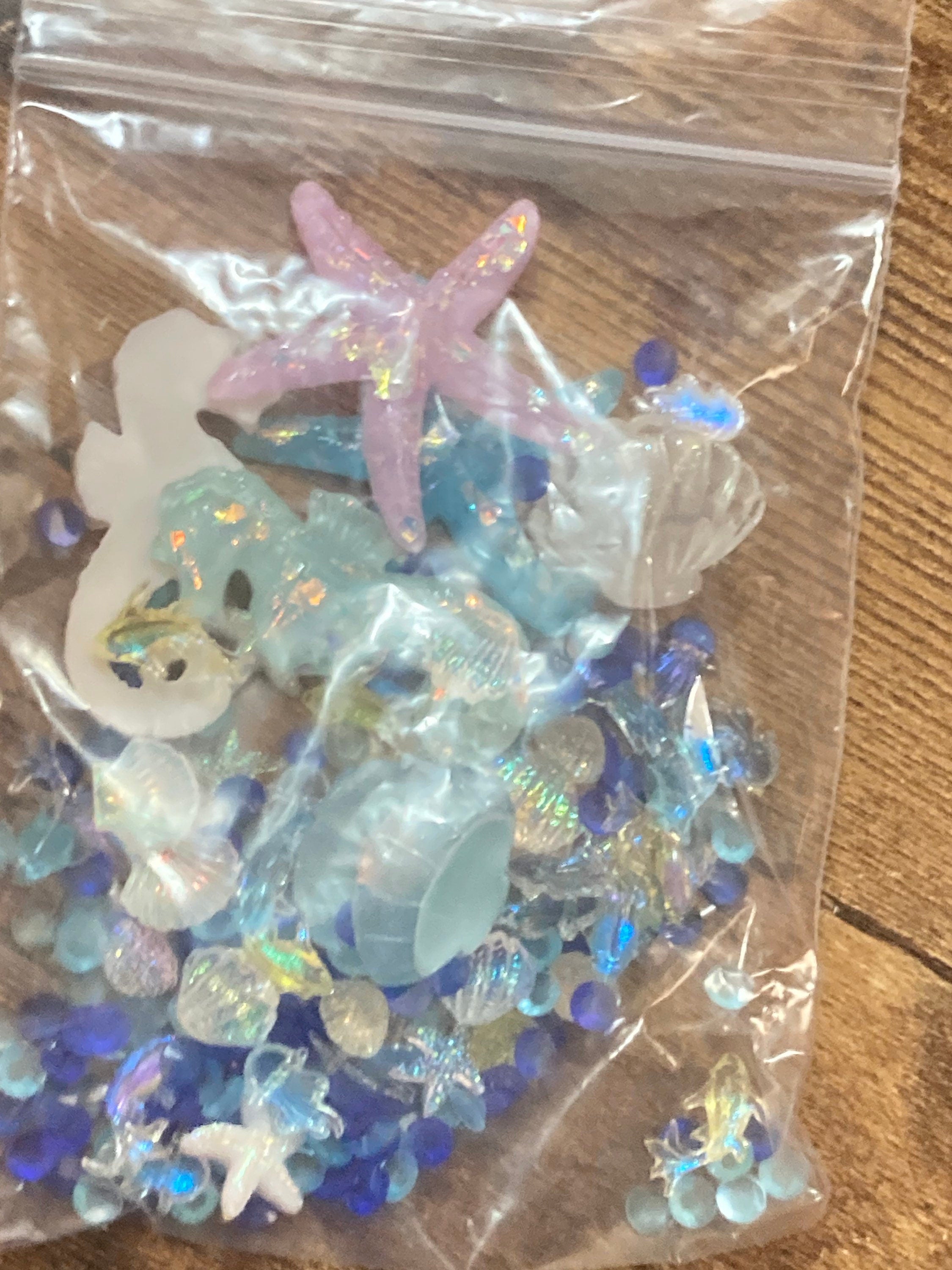 Mixed bag of sealife nautical fish, shells and starfish miniature plastic cabochons for craft