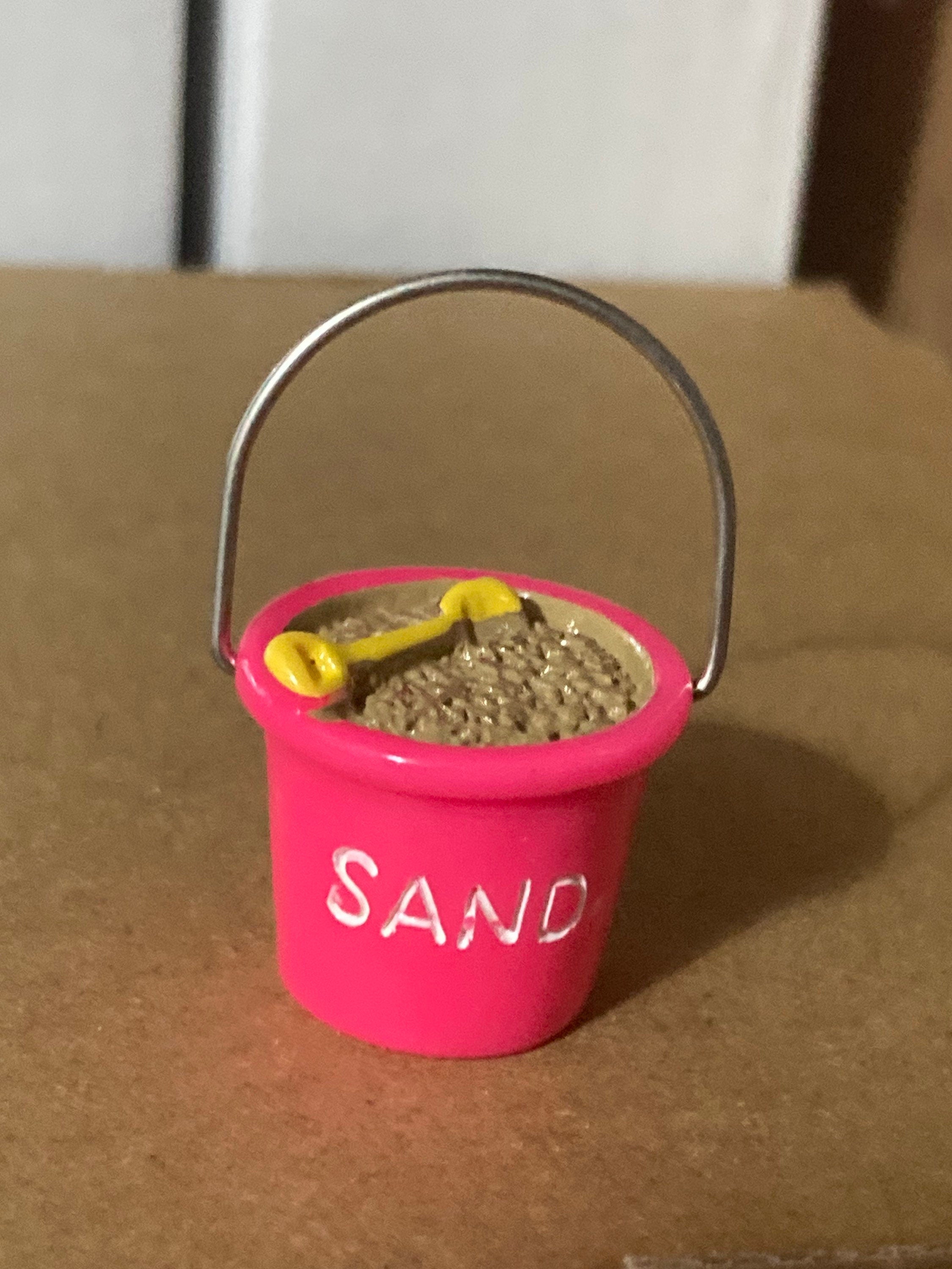 Doll’s house or cake topper miniature sand bucket and spade decoration seaside nautical scenery