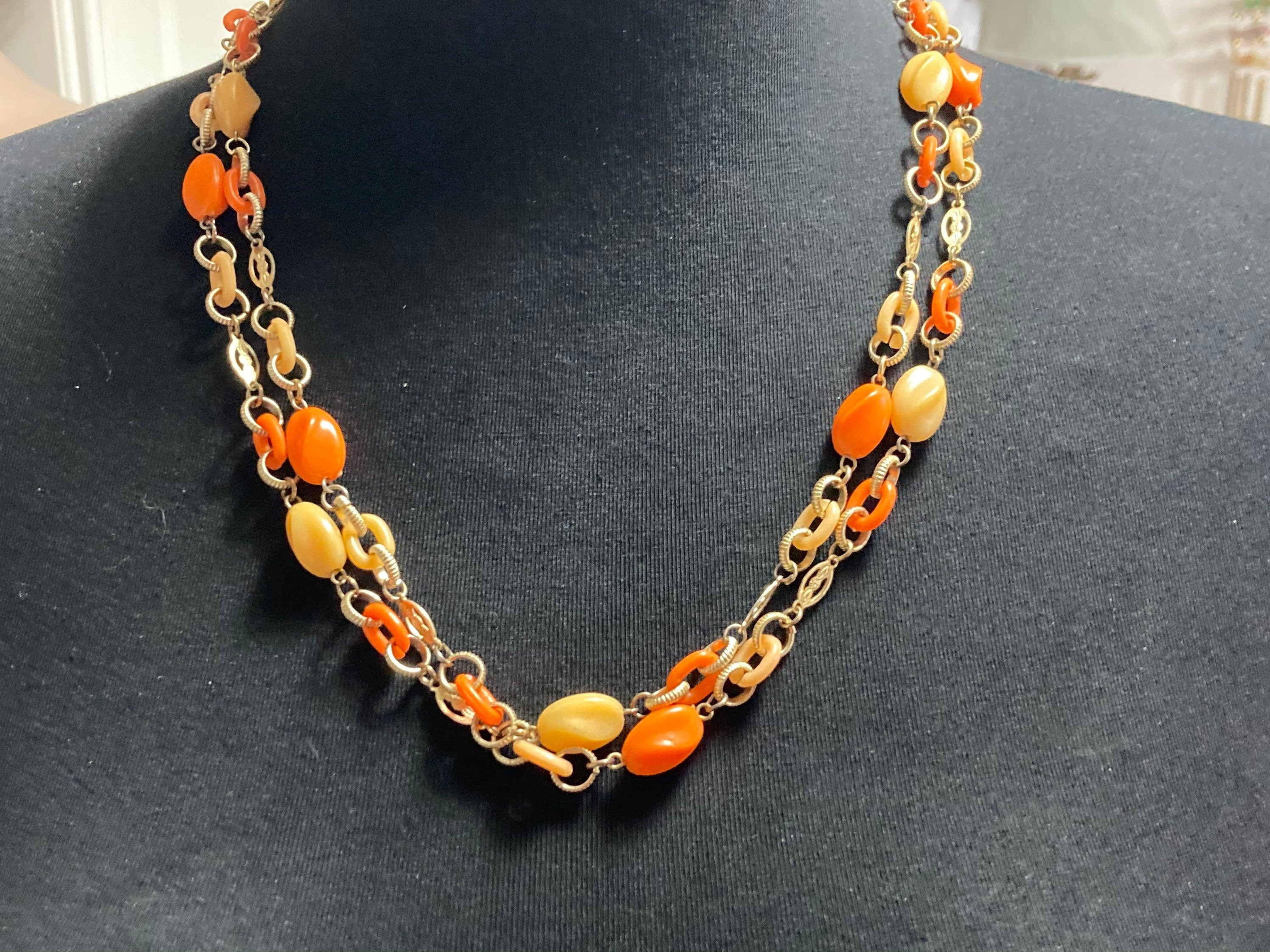 Peach orange plastic beaded multi strand aluminium vintage necklace