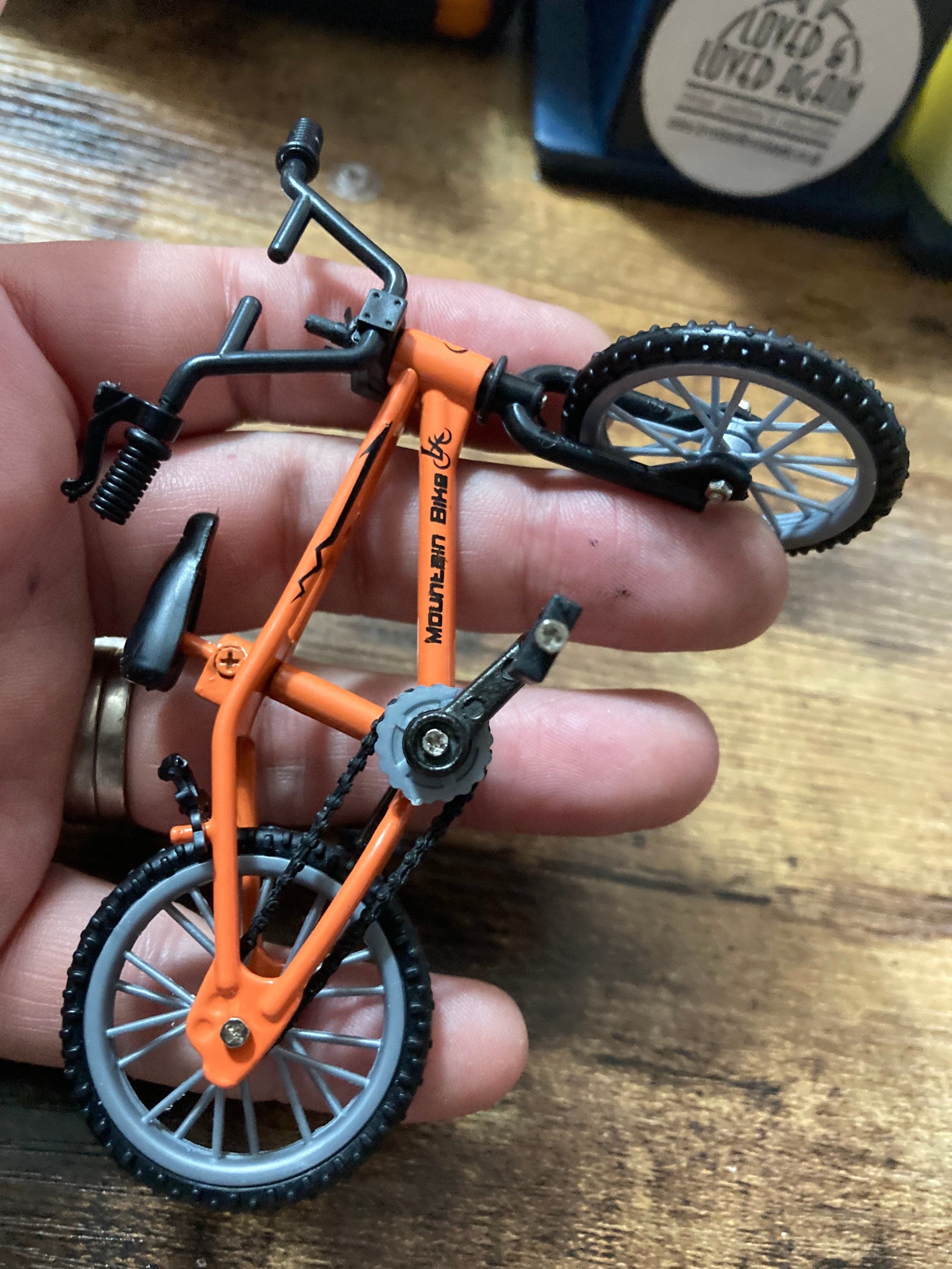 Miniature plastic orange mountain bike BMX cake topper decoration