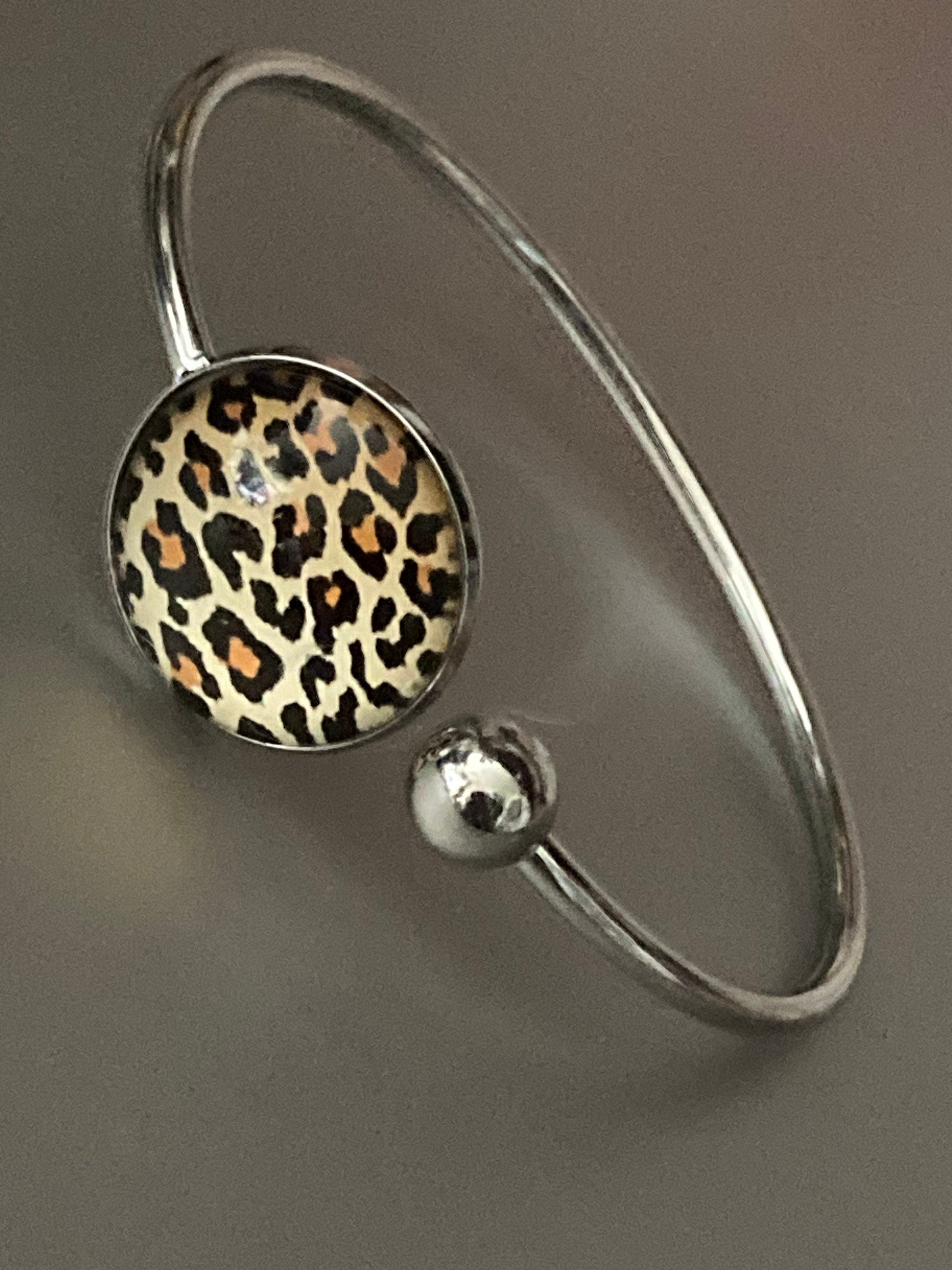 Leopard print cabochon bangle bracelet, stainless steel glass