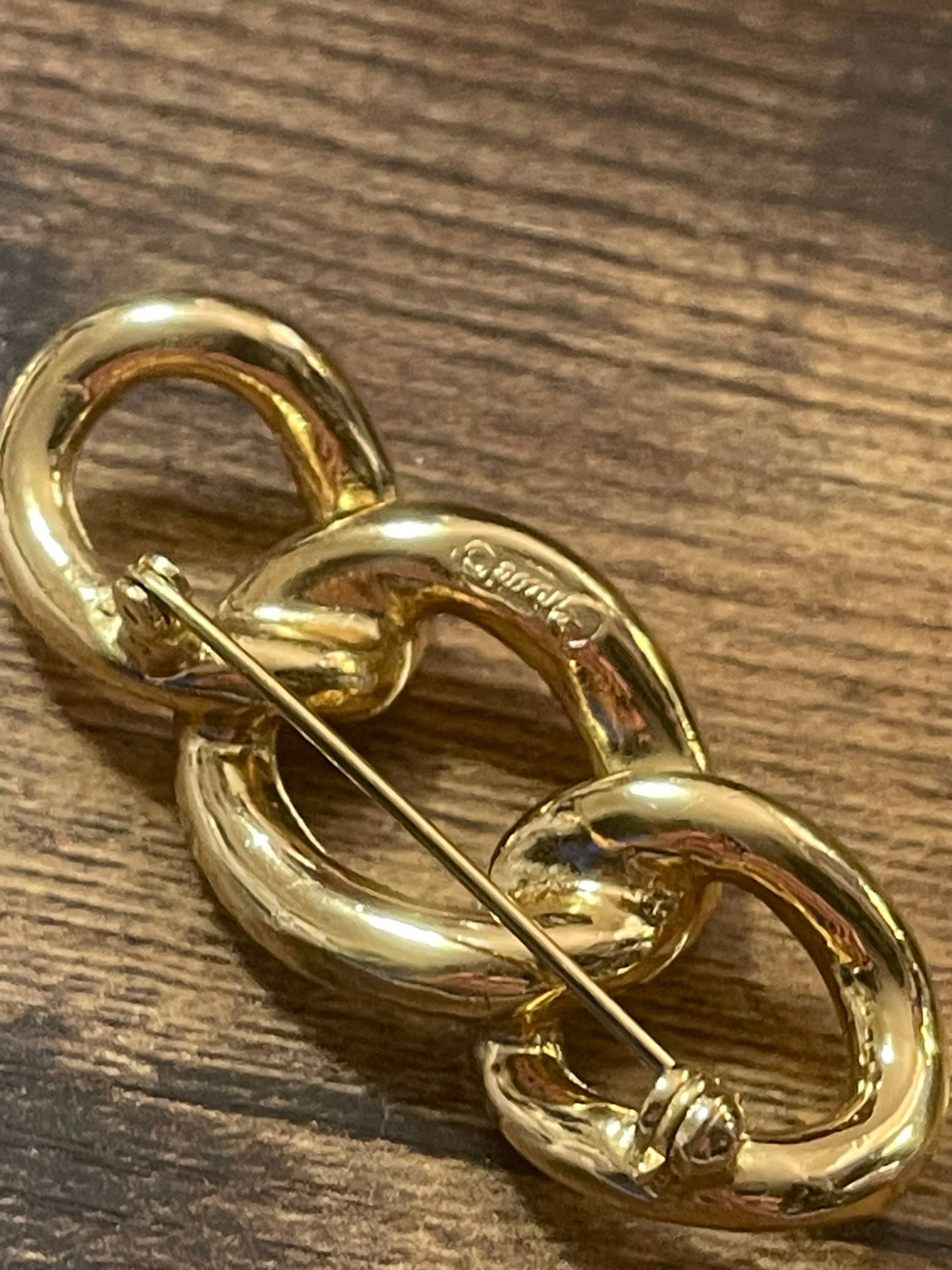 Signed grosse gold chain link and diamanté brooch designer