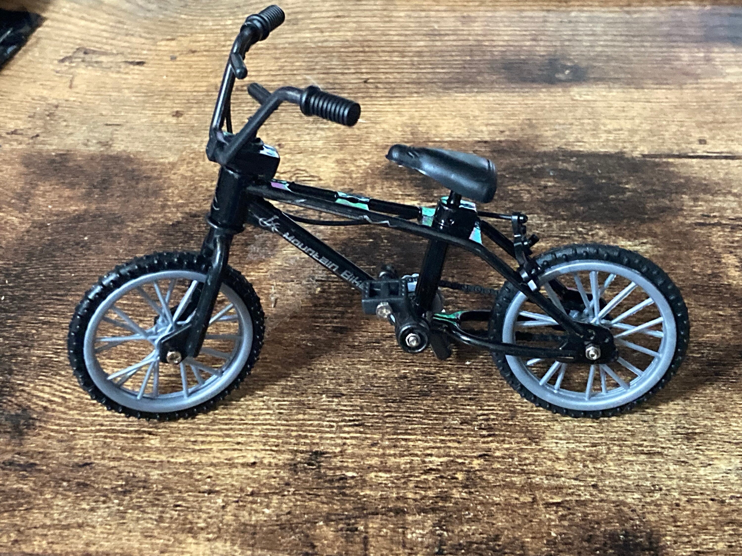 Miniature plastic black mountain bike BMX cake topper decoration