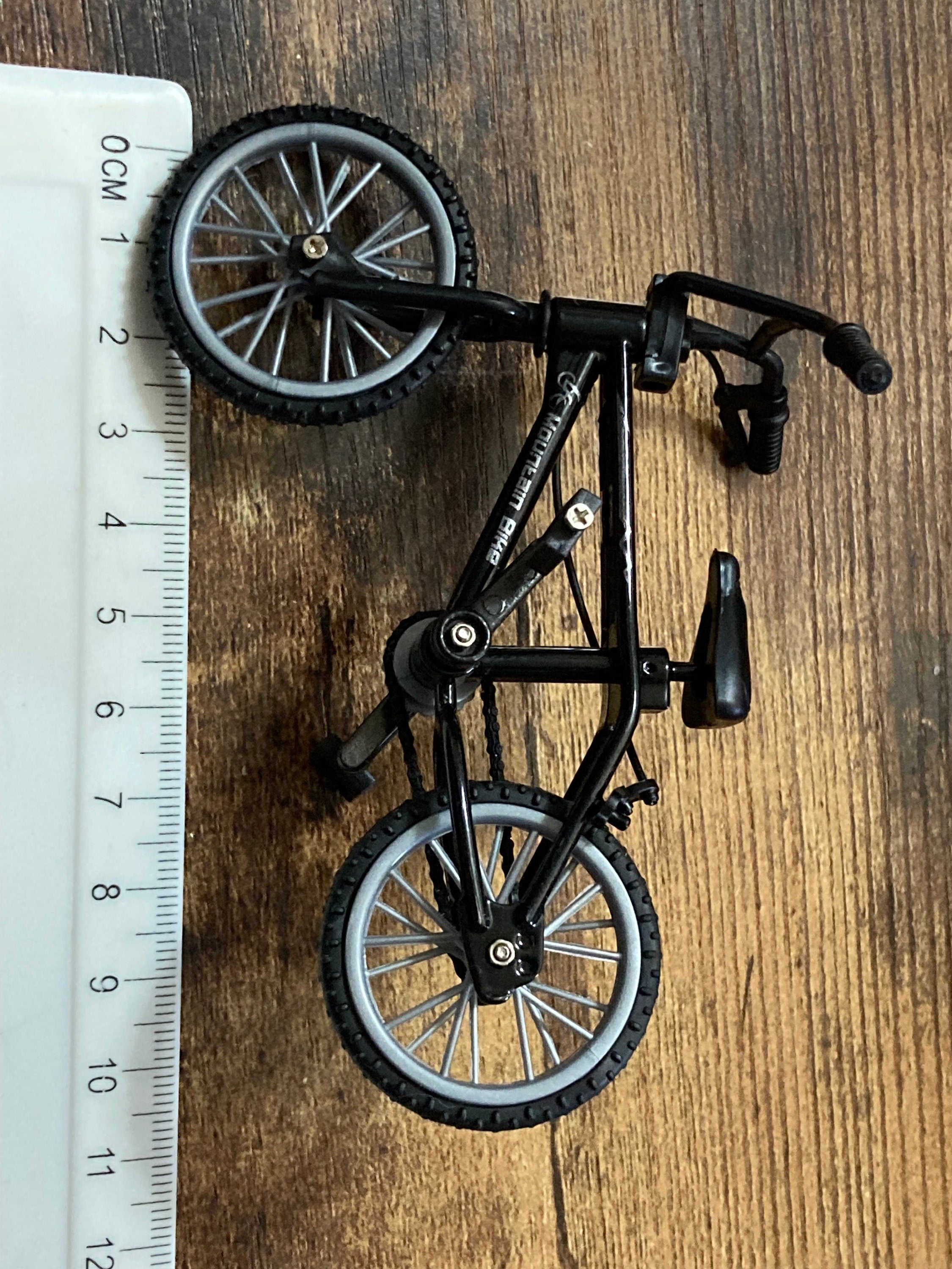 Miniature plastic black mountain bike BMX cake topper decoration