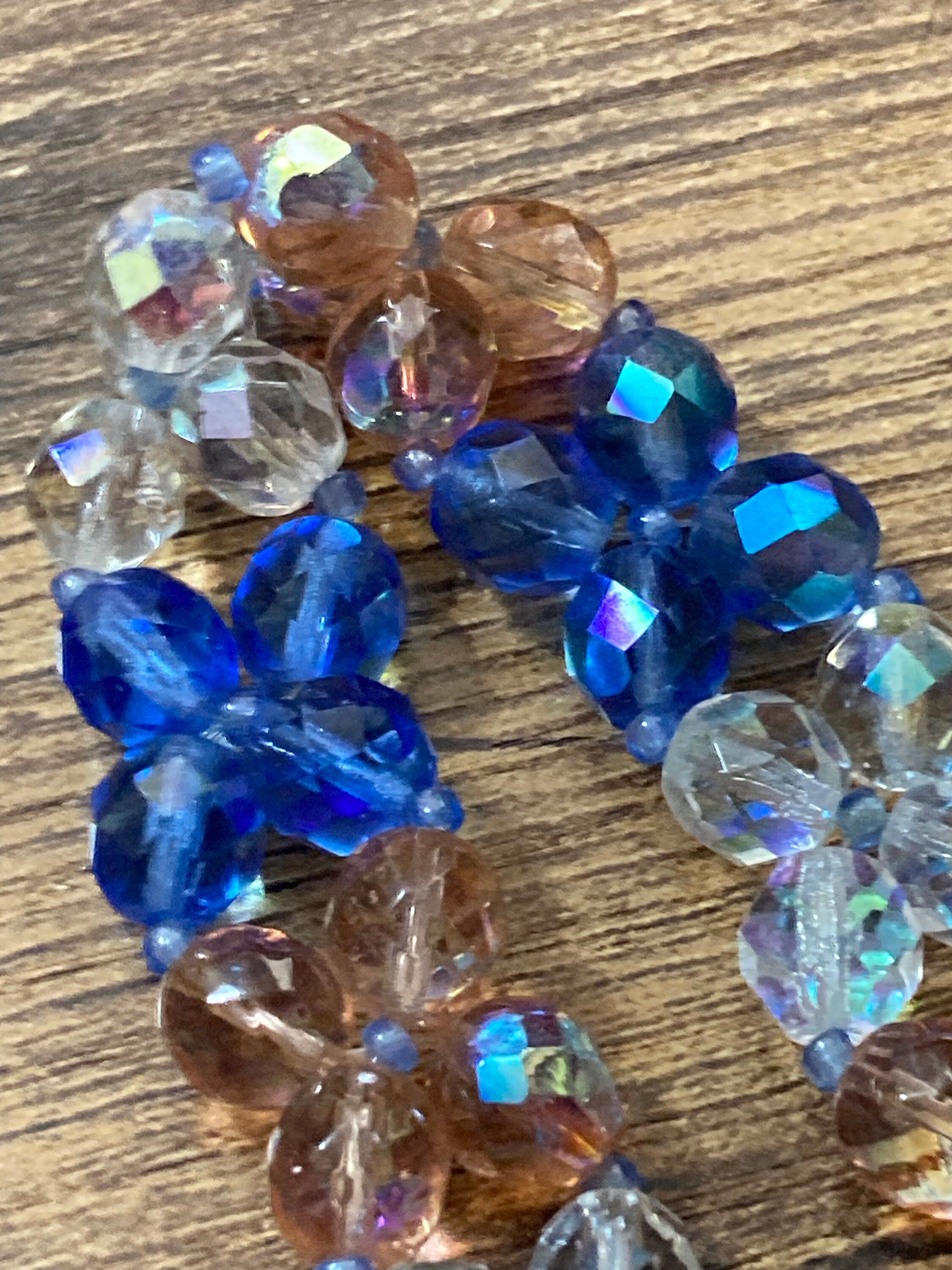 Beautiful 3 row wide blue pink clear AB hues face red glass crystal beaded bracelet perfect for layering