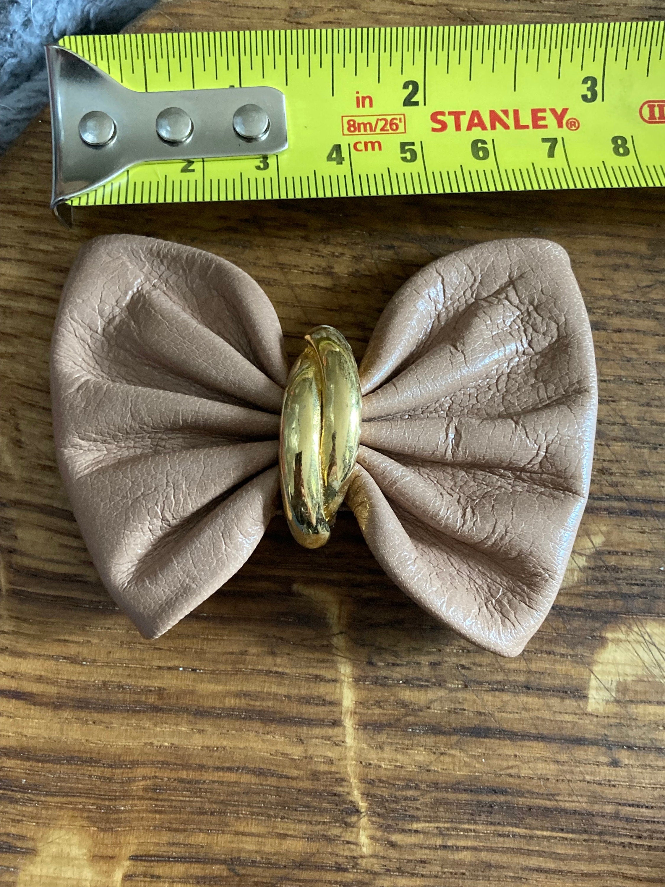 Vintage pair of beige neutral nude leather BOW shoe clips with gold detail