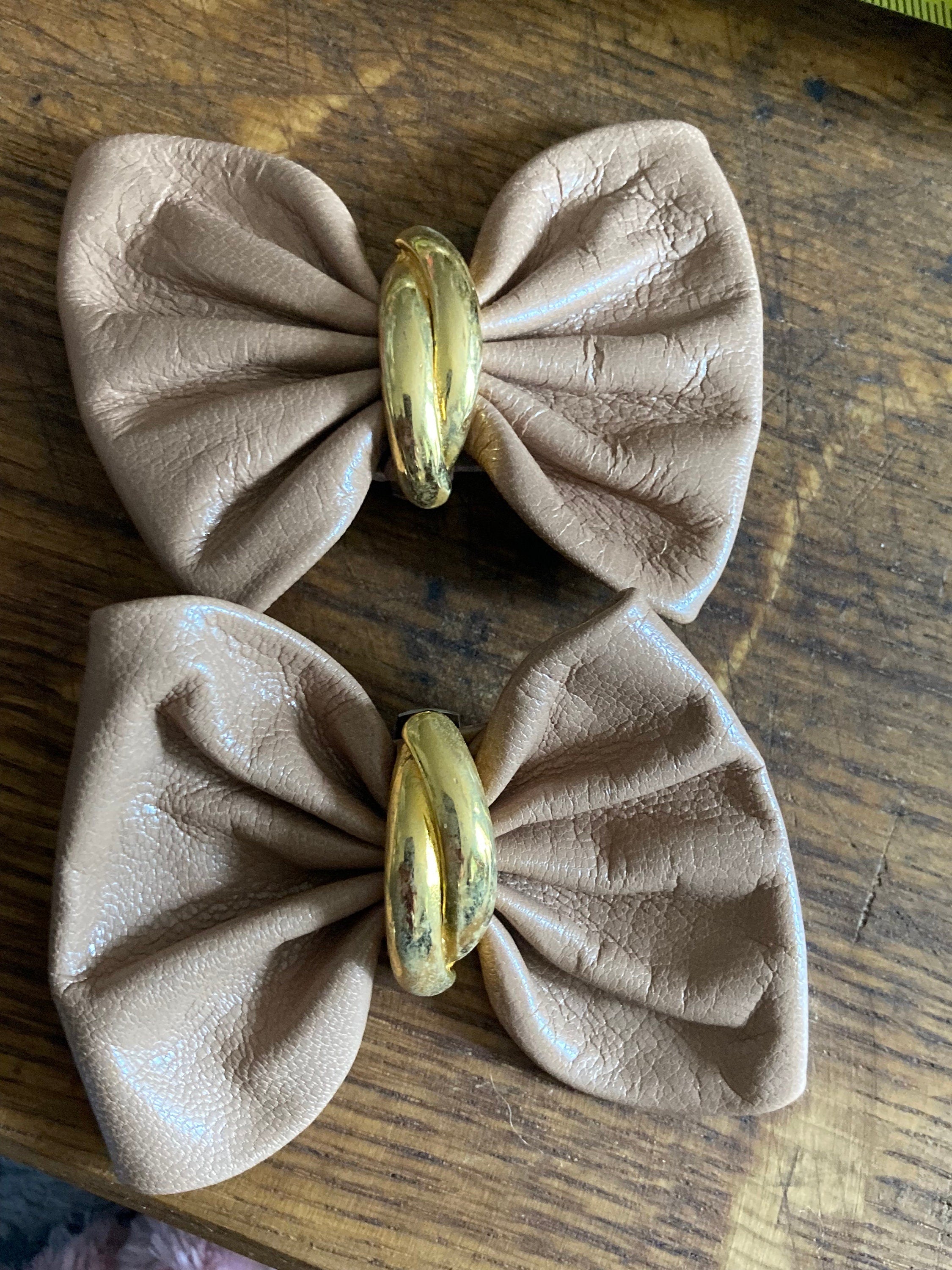 Vintage pair of beige neutral nude leather BOW shoe clips with gold detail