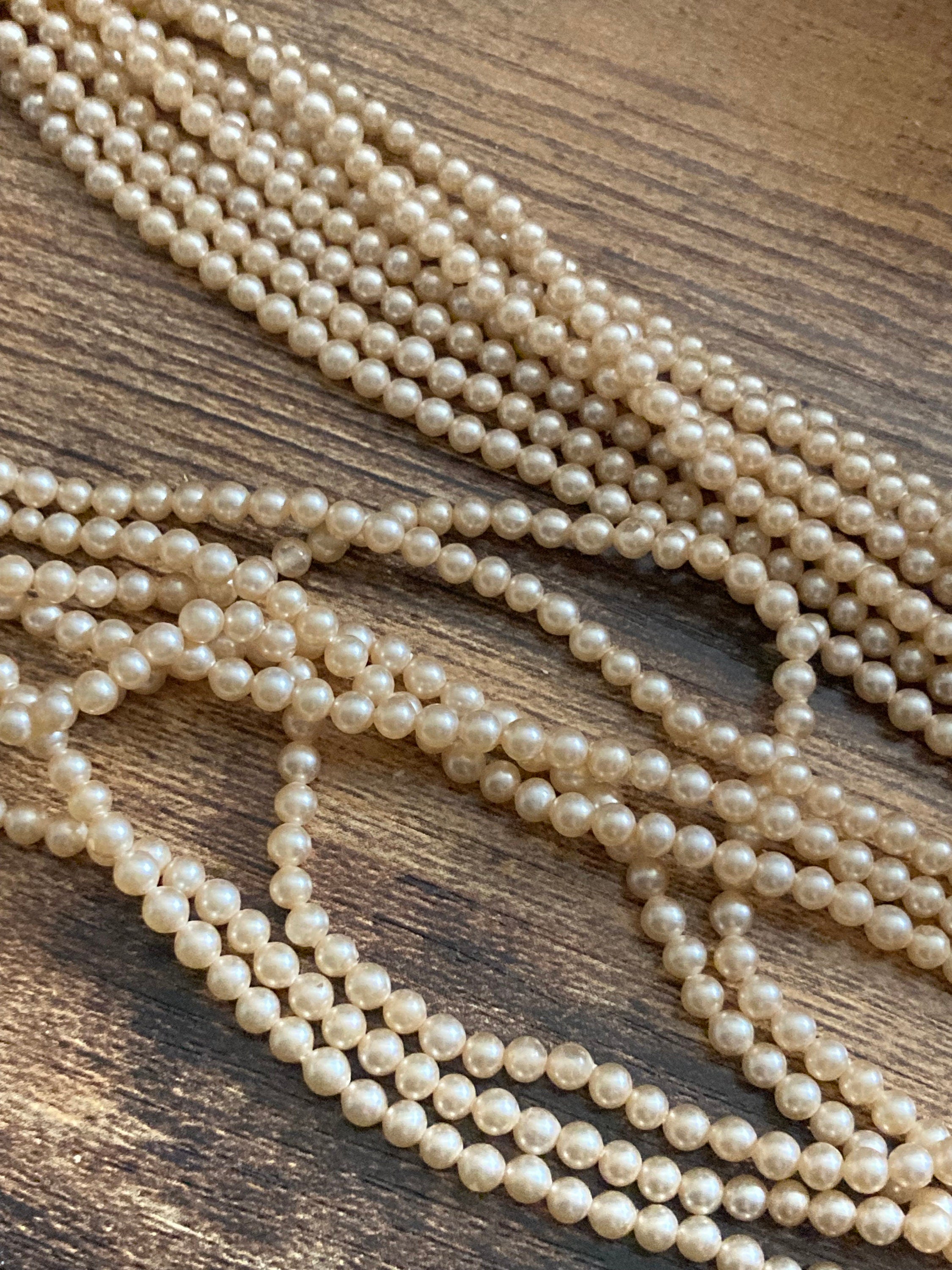 Stamped HK Hong Kong 9 row strand glass Pearl necklace