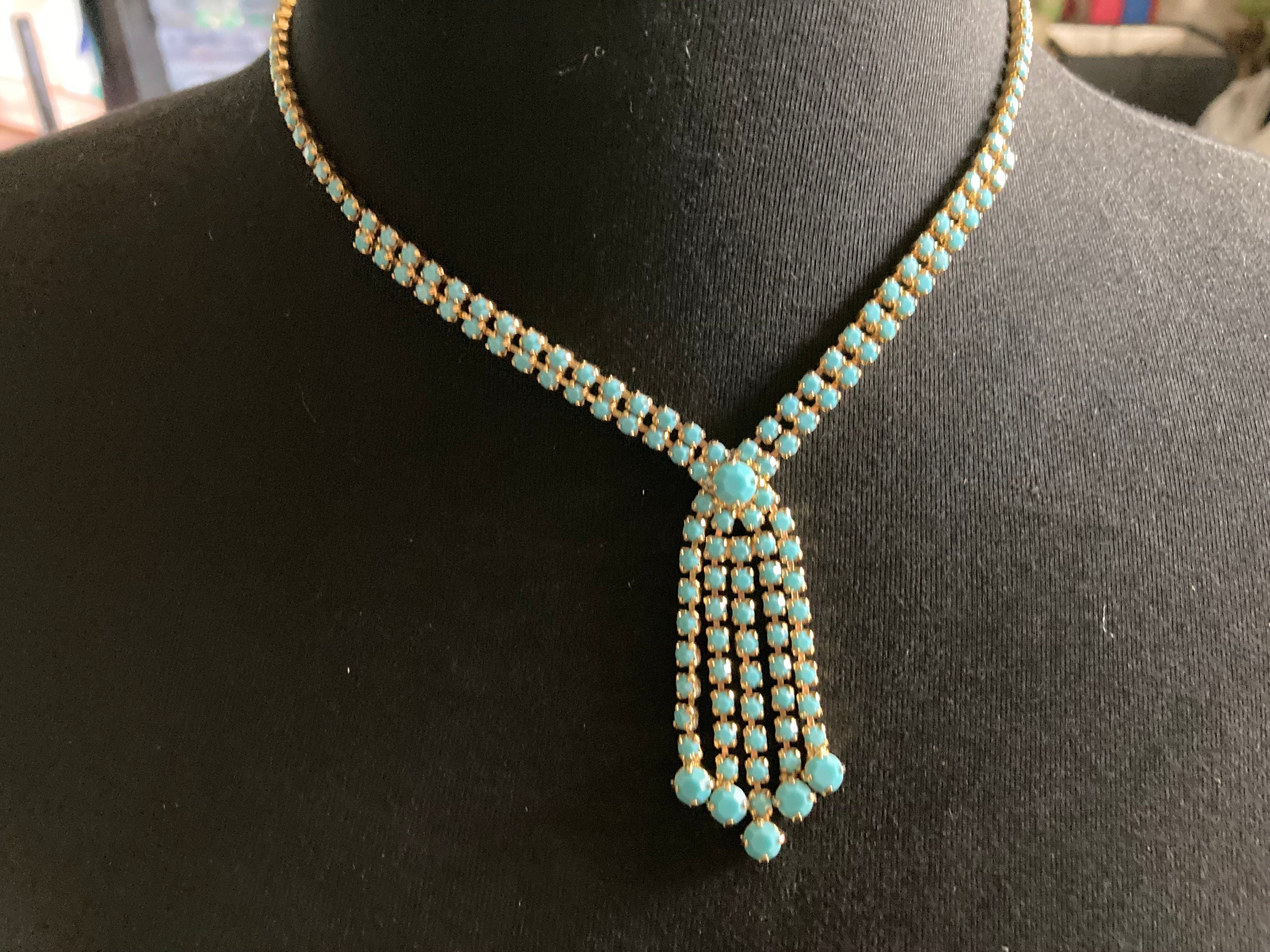 Vintage gold tone mesh lariat drop necklace with turquoise glass paste stones