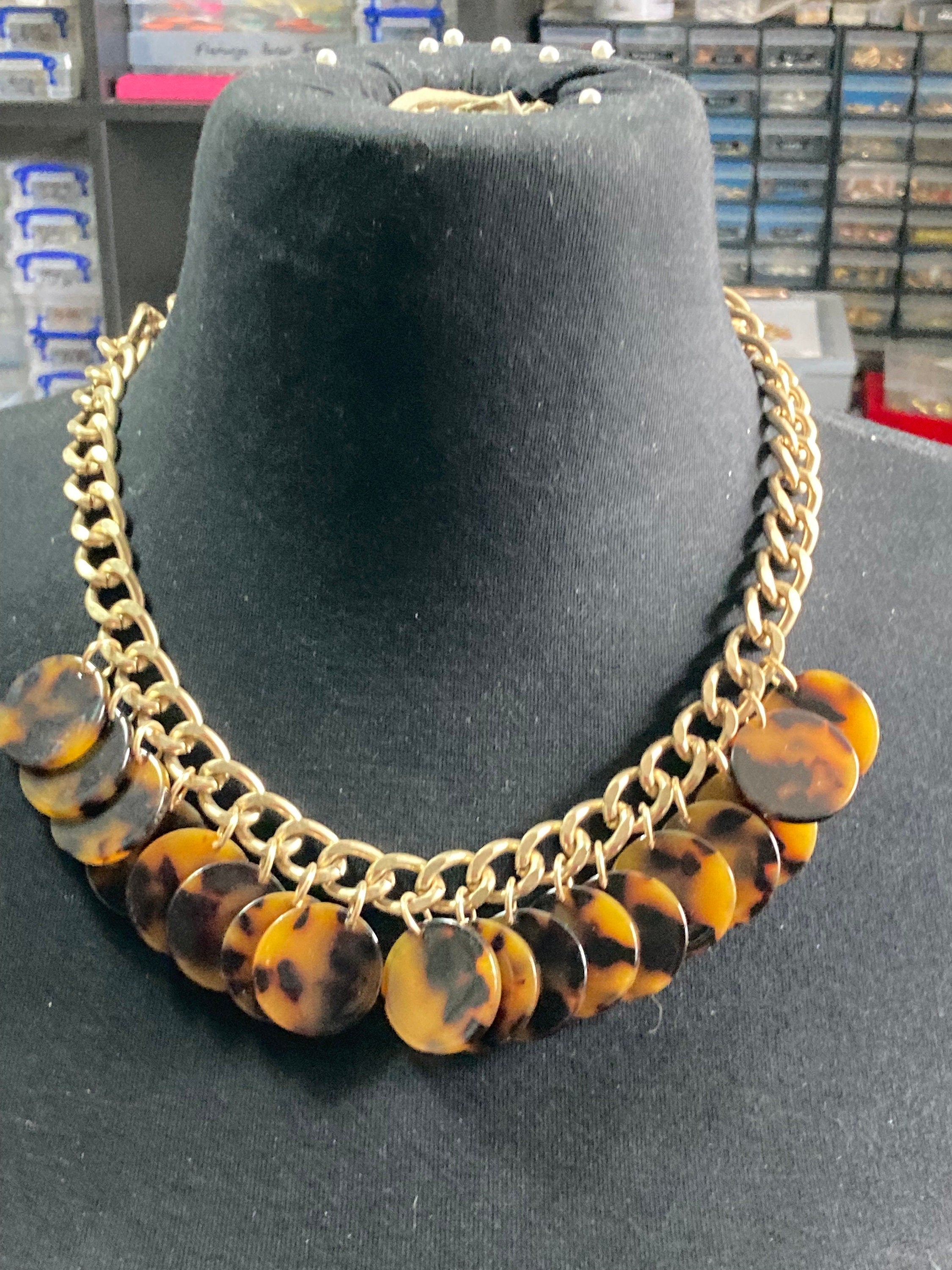 Chunky gold tone faux tortoiseshell disc collar necklace