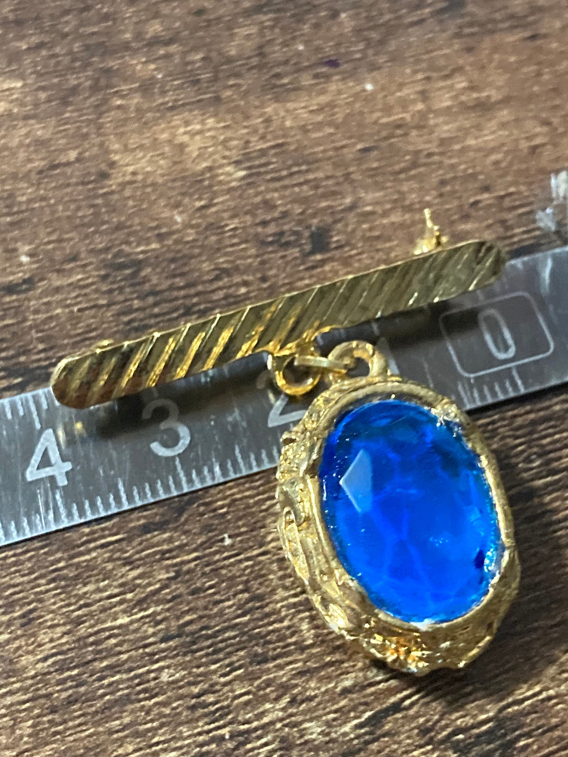 True vintage gold plated faux Sapphire blue Victorian style glass charm drop medal brooch old shop stock
