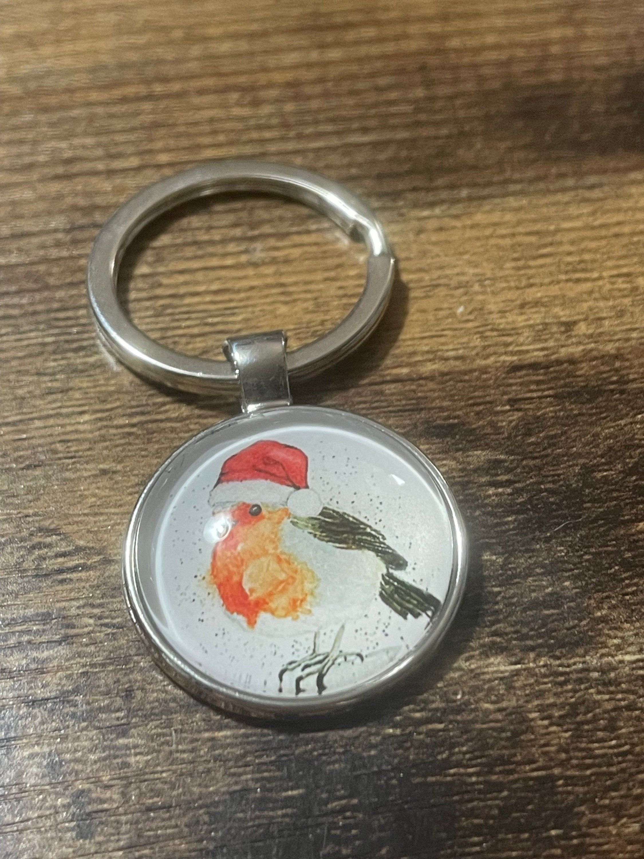 Handmade festive Christmas robin garden bird silver tone keyring with 25mm glass cabochon