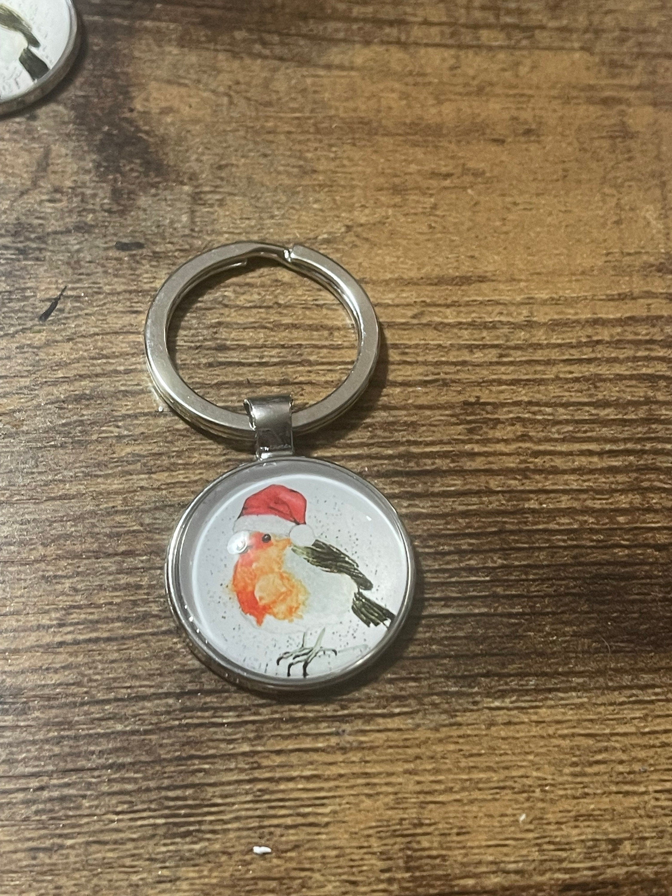 Handmade festive Christmas robin garden bird silver tone keyring with 25mm glass cabochon