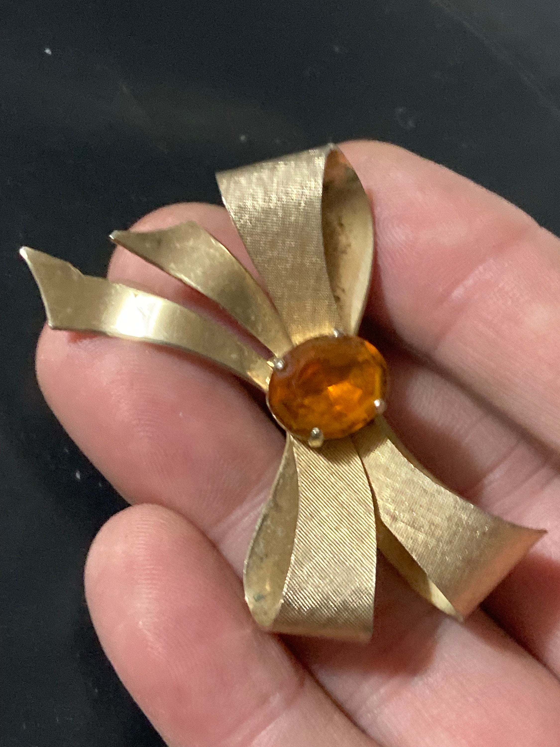 Vintage 1960s Gold Tone Bow Brooch: Faux Citrine Glass