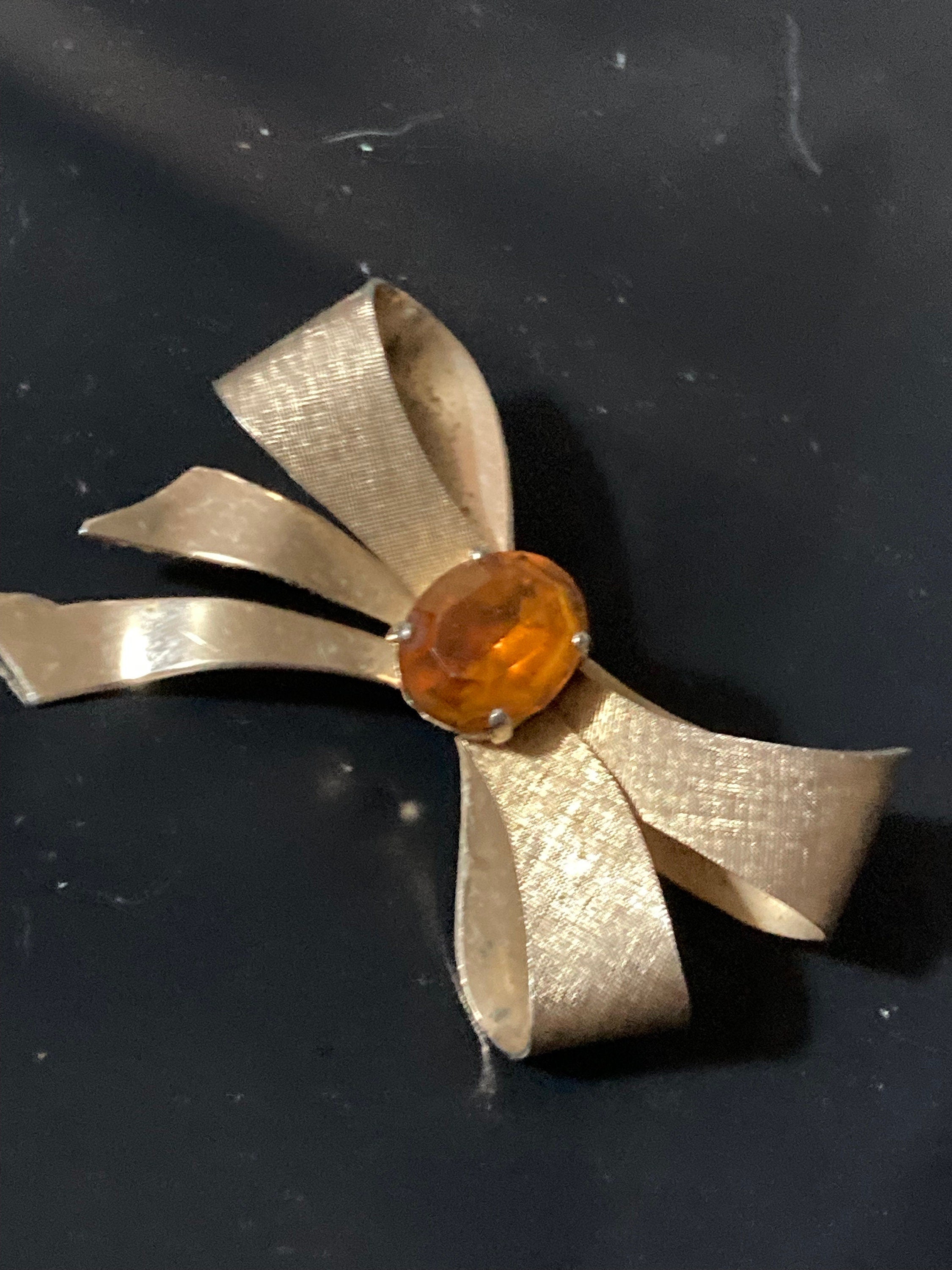 Vintage 1960s Gold Tone Bow Brooch: Faux Citrine Glass