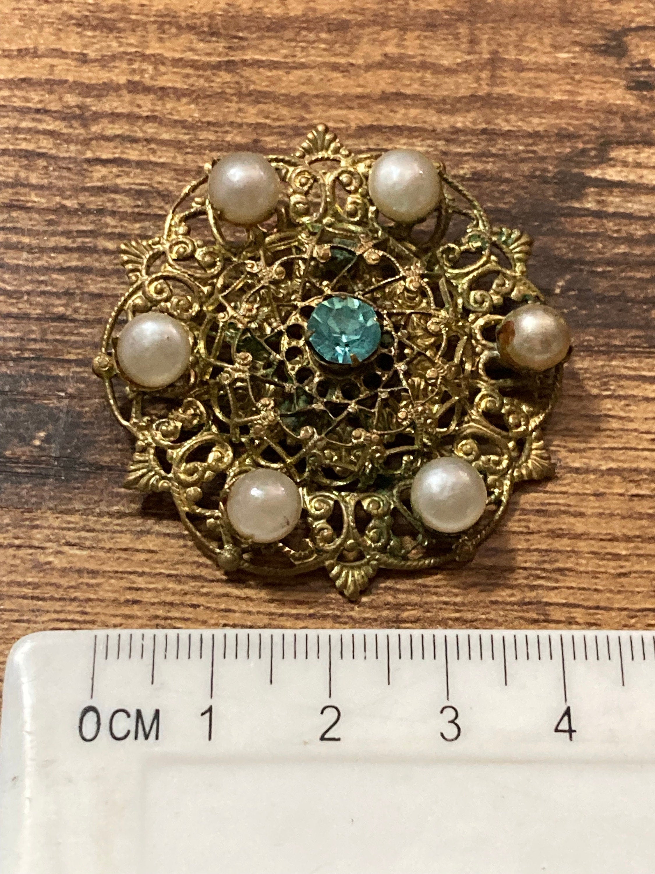 Vintage Czech brass filigree faux pearl and light blue sapphire Rhinestone diamanté Brooch