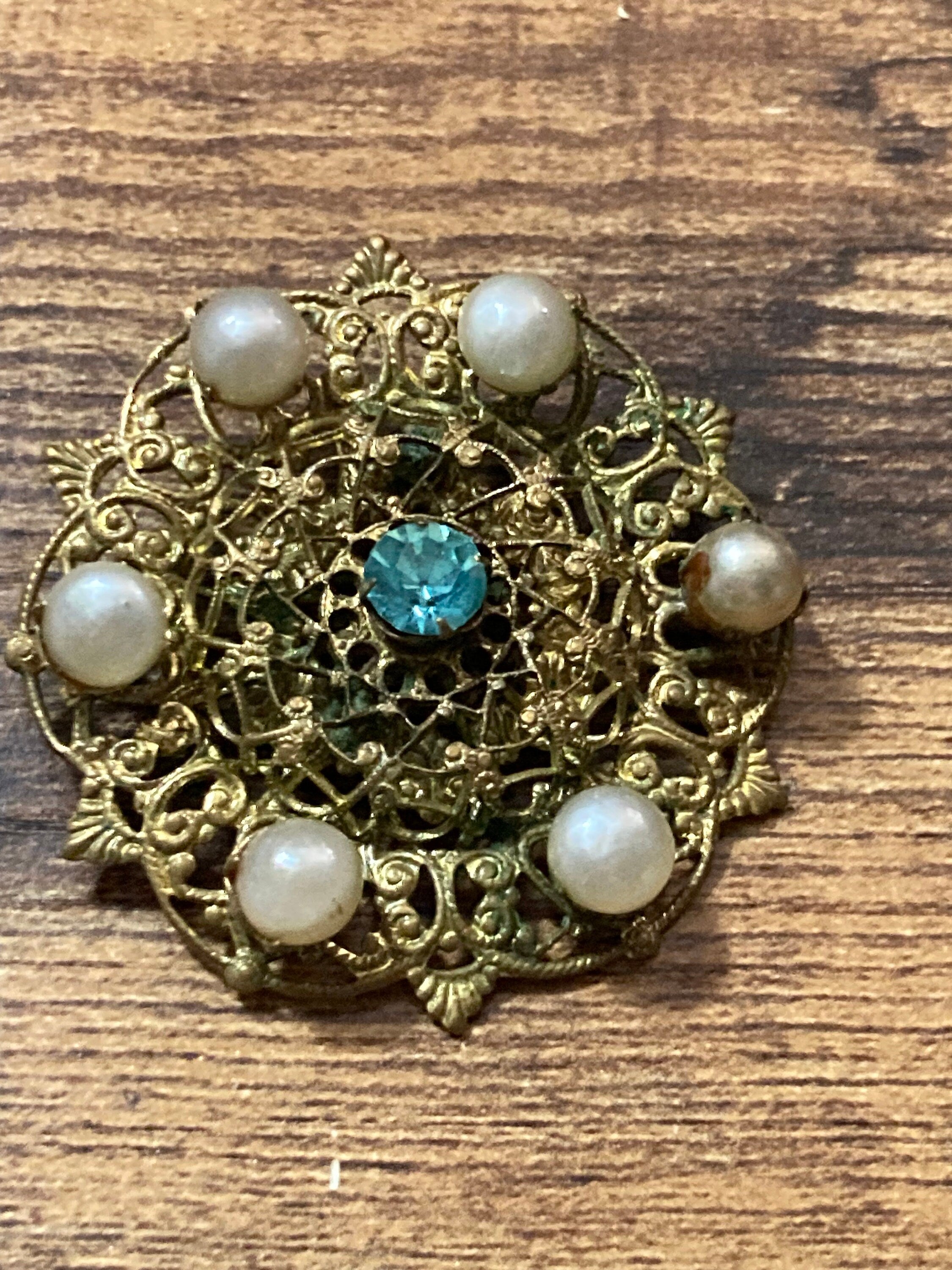 Vintage Czech brass filigree faux pearl and light blue sapphire Rhinestone diamanté Brooch