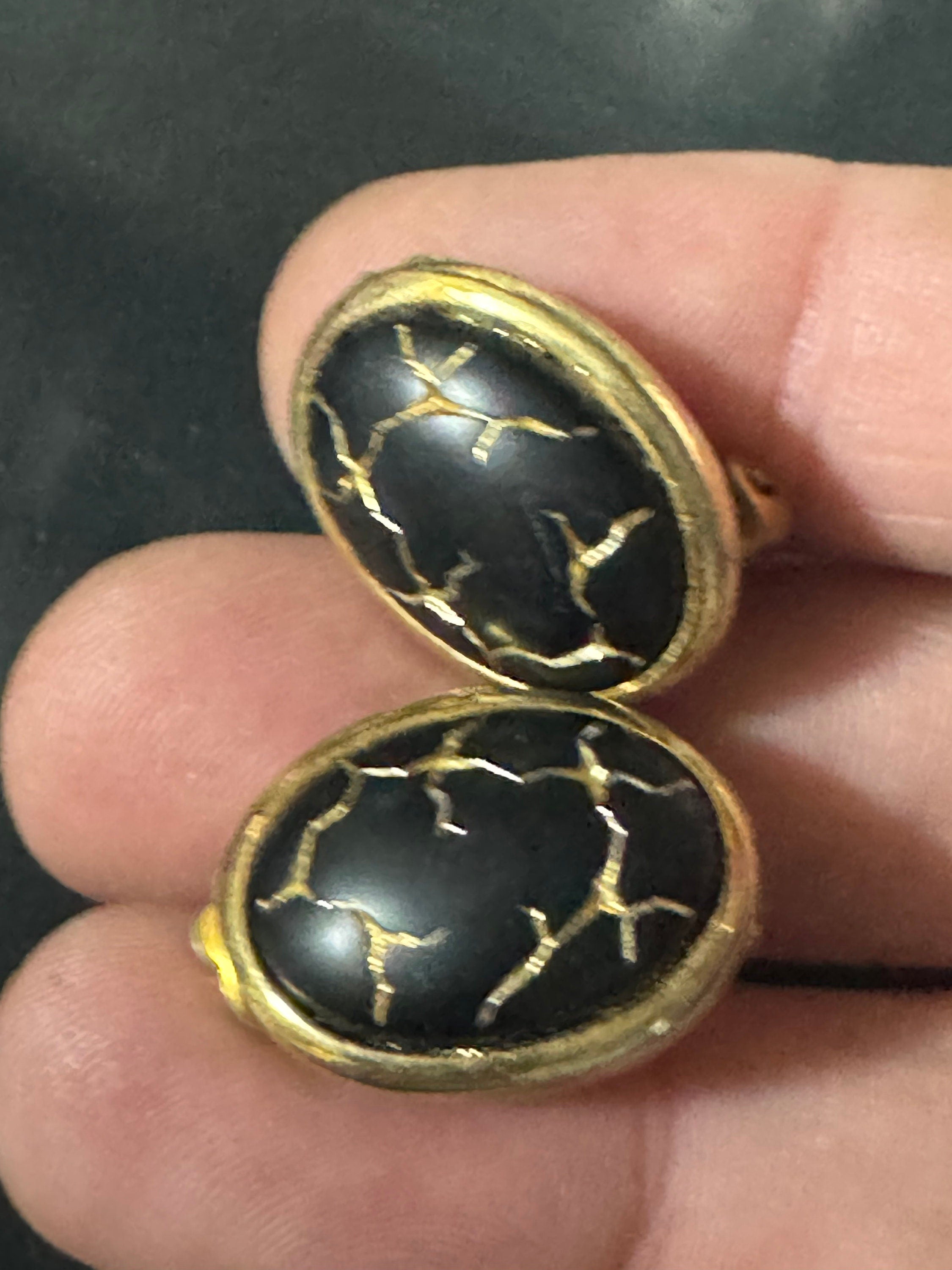 Gold tone gold black enamel Crackle glaze clip on earrings