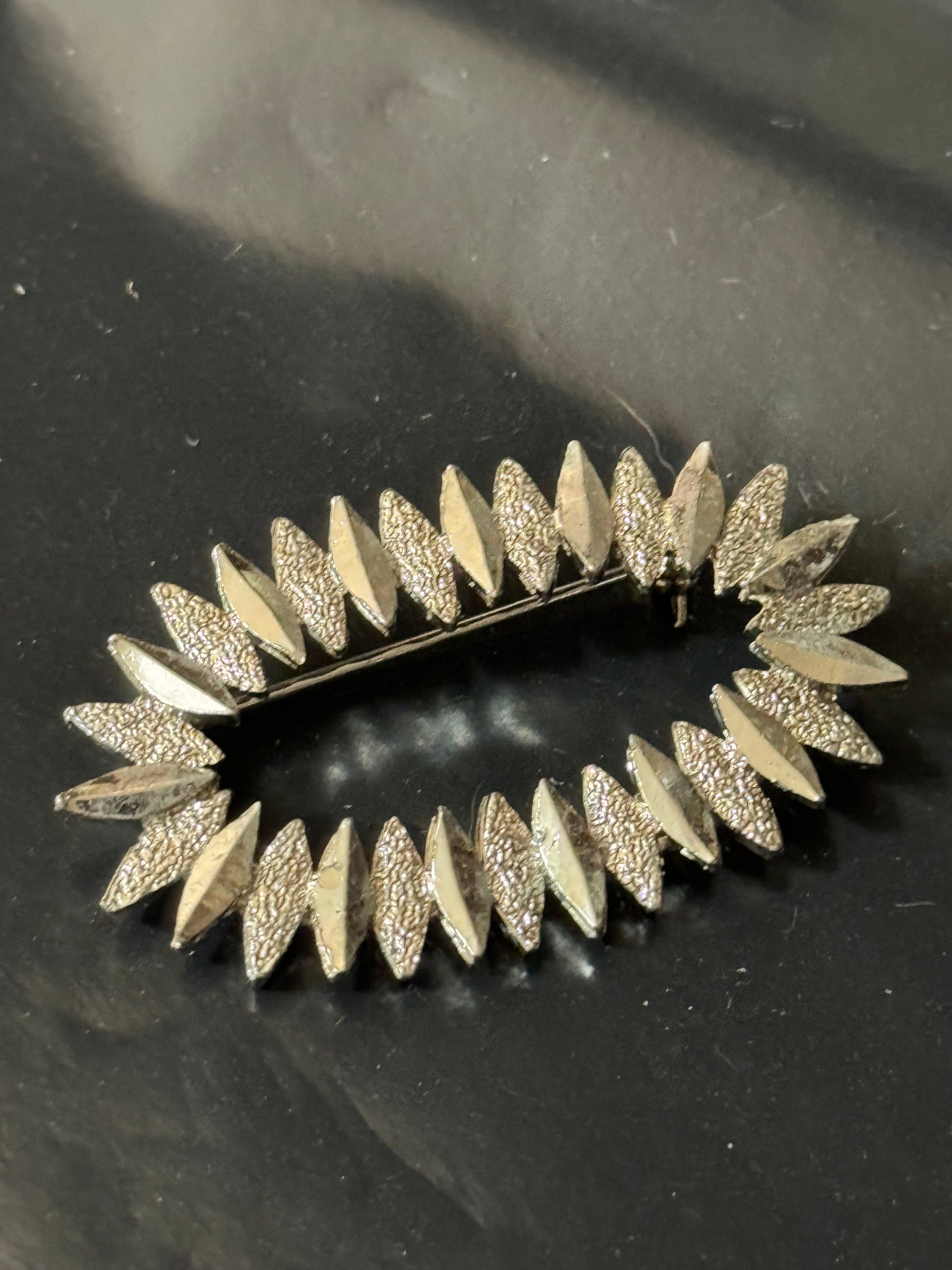 silver abstract oval brutalist brooch, vintage 1970s