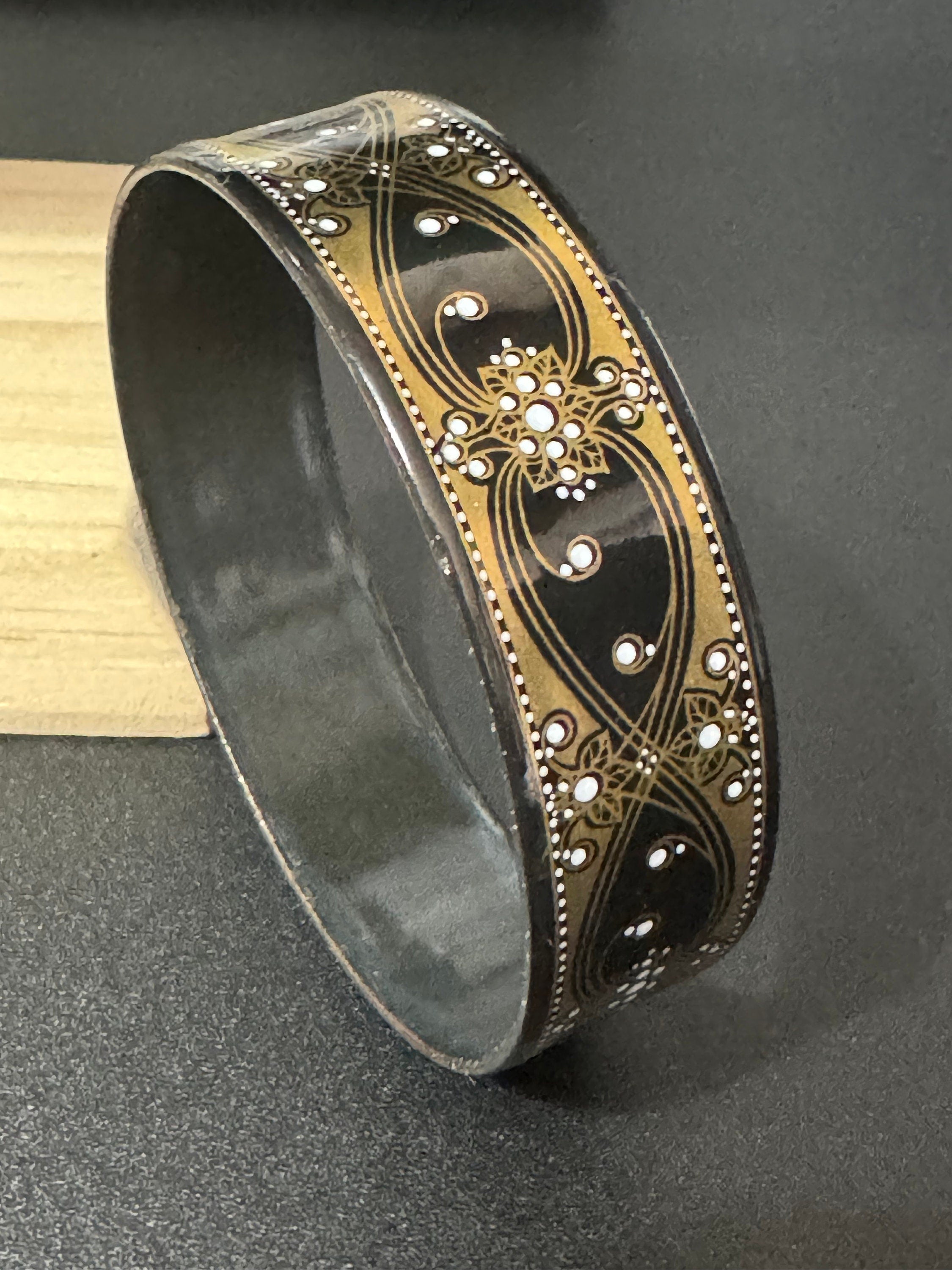 Vintage Michaela Frey black and gold enamel bangle, antique style wide from Austria
