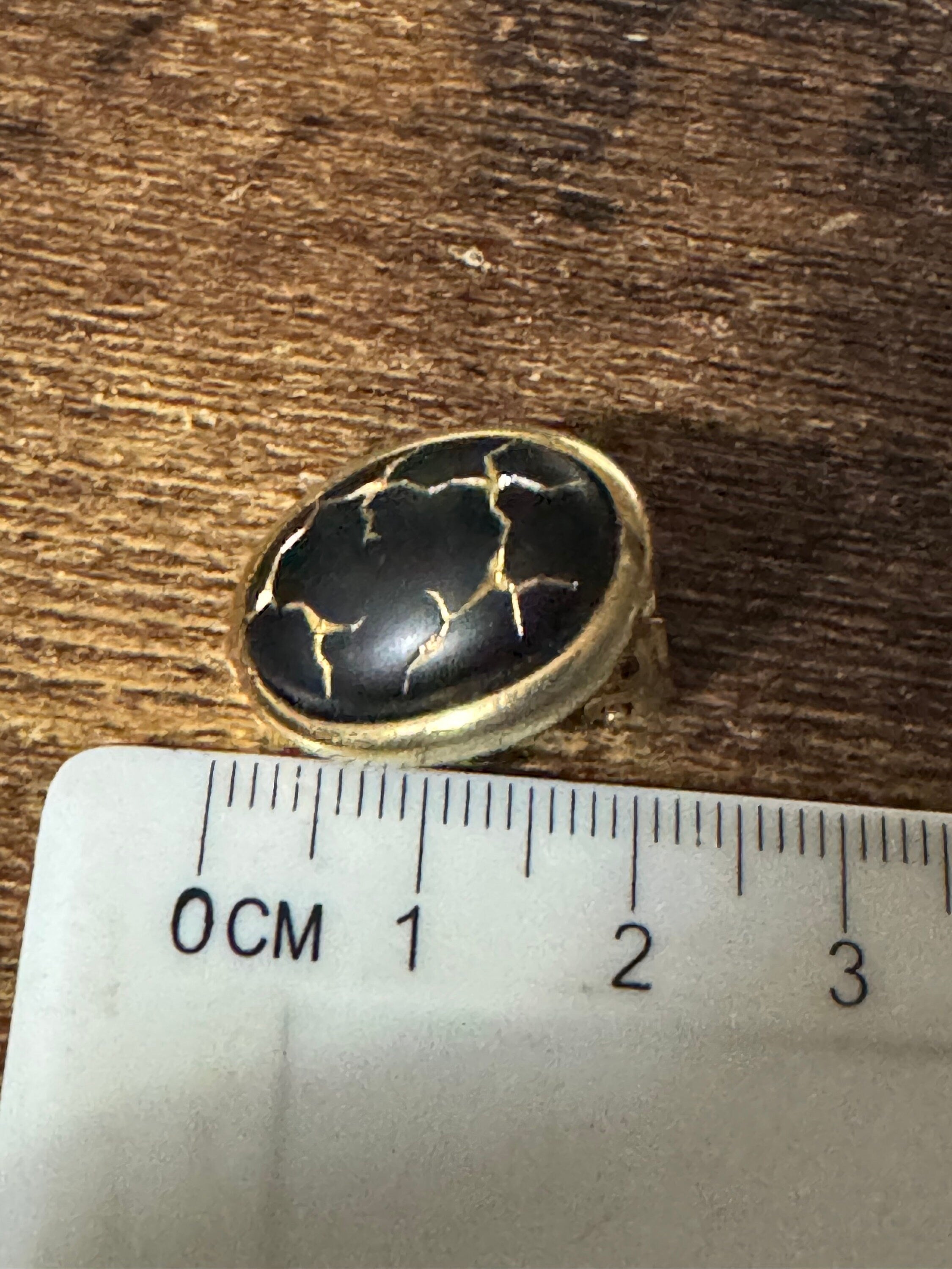Gold tone gold black enamel Crackle glaze clip on earrings