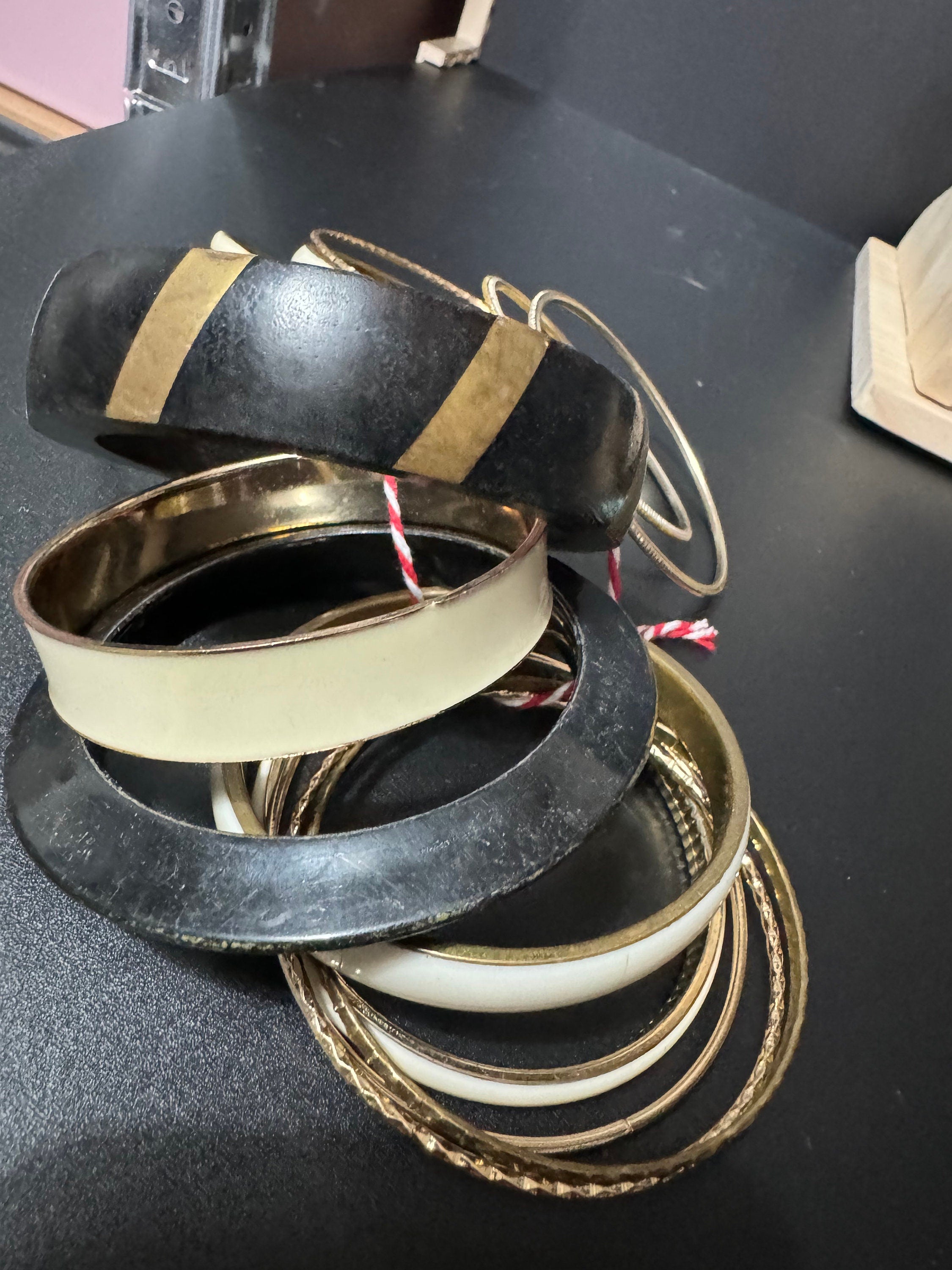 Armful of vintage cream black and gold tones slim and wide tacking boho bangles